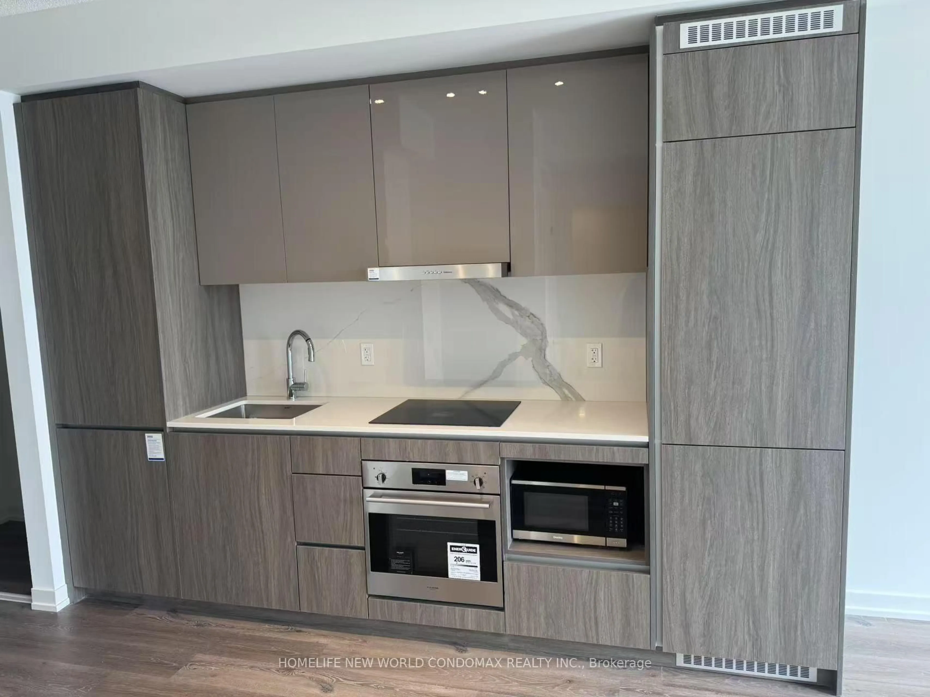 Standard kitchen, wood/laminate floor for 28 Interchange Way #1807, Vaughan Ontario L4K 0R2