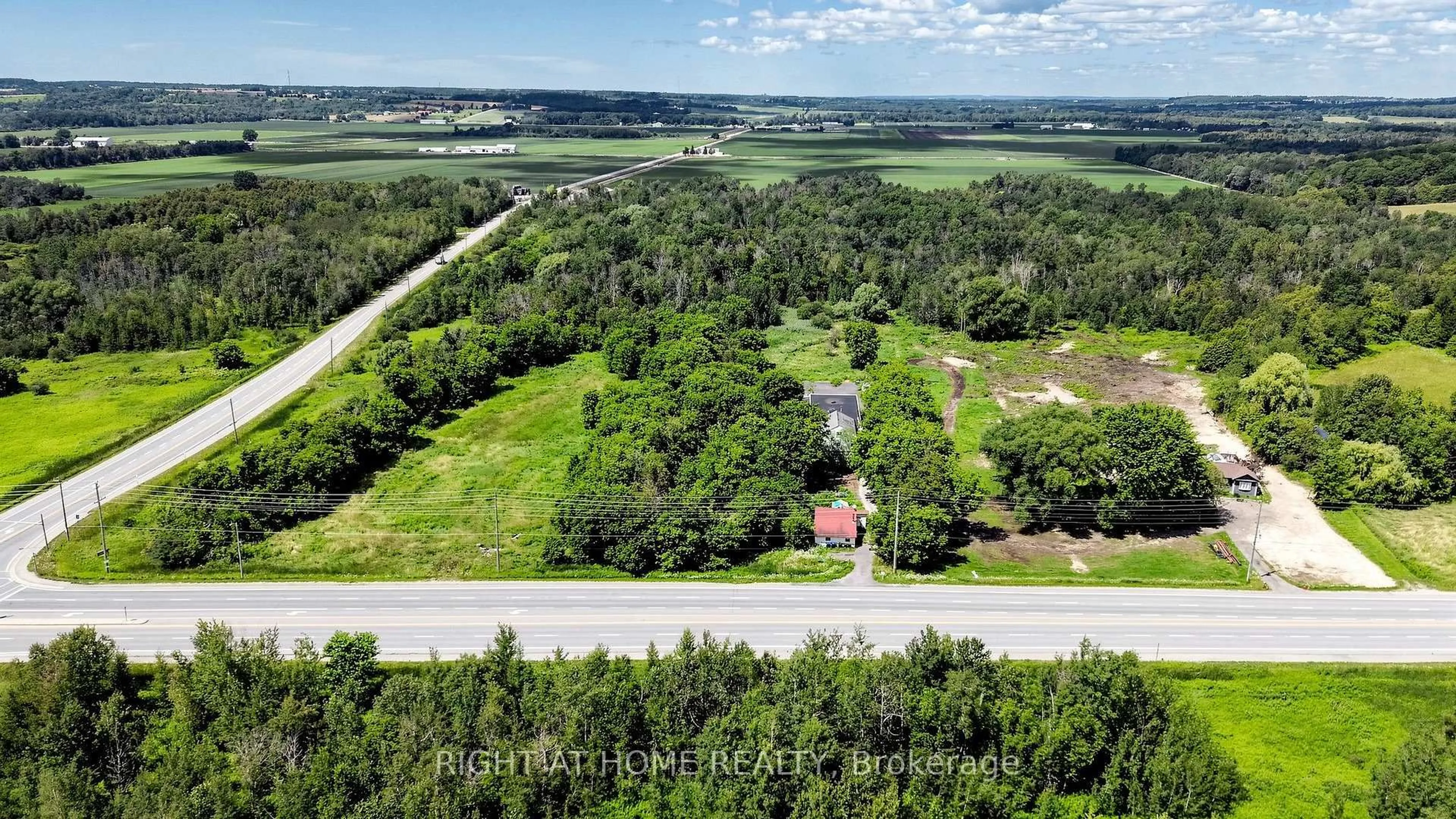 A pic from outside/outdoor area/front of a property/back of a property/a pic from drone, water/lake/river/ocean view for 2884 COUNTY RD 89 Rd, Innisfil Ontario L0L 1L0