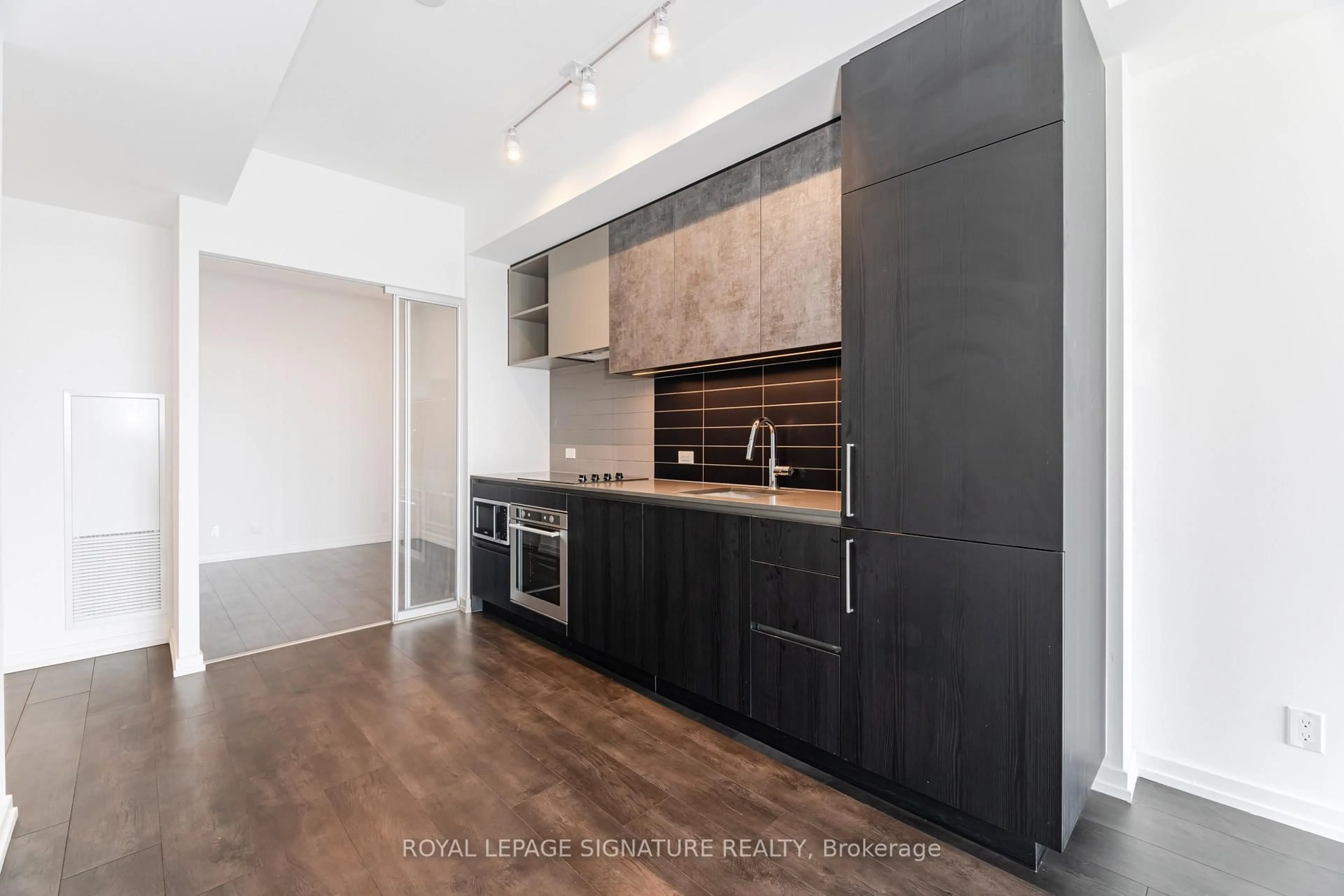 Open concept kitchen, wood/laminate floor for 7890 Jane St #4508, Vaughan Ontario L4K 0K9