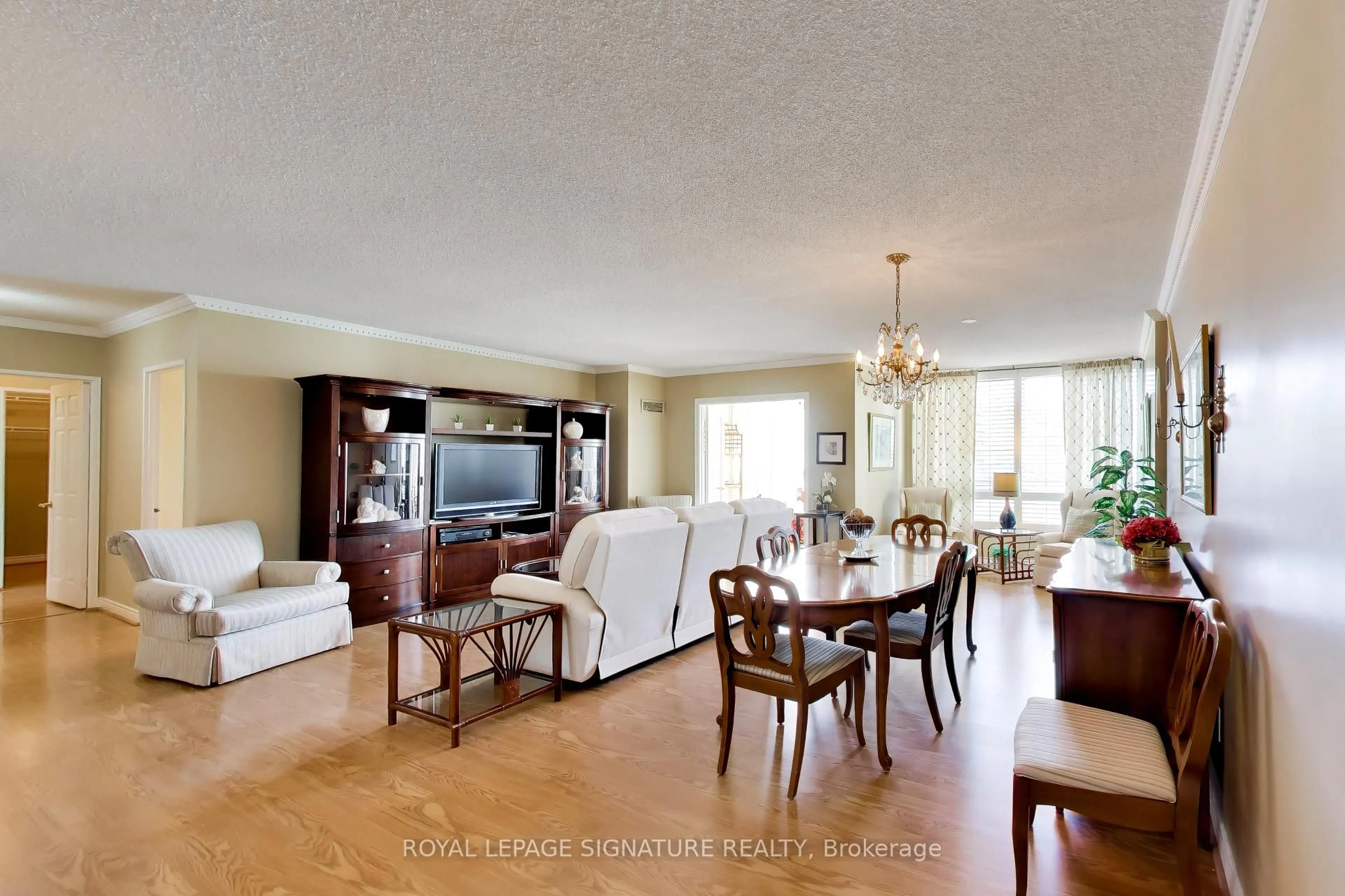 Living room with furniture, wood/laminate floor for 1 Clark Ave #1802, Vaughan Ontario L4J 7Y6