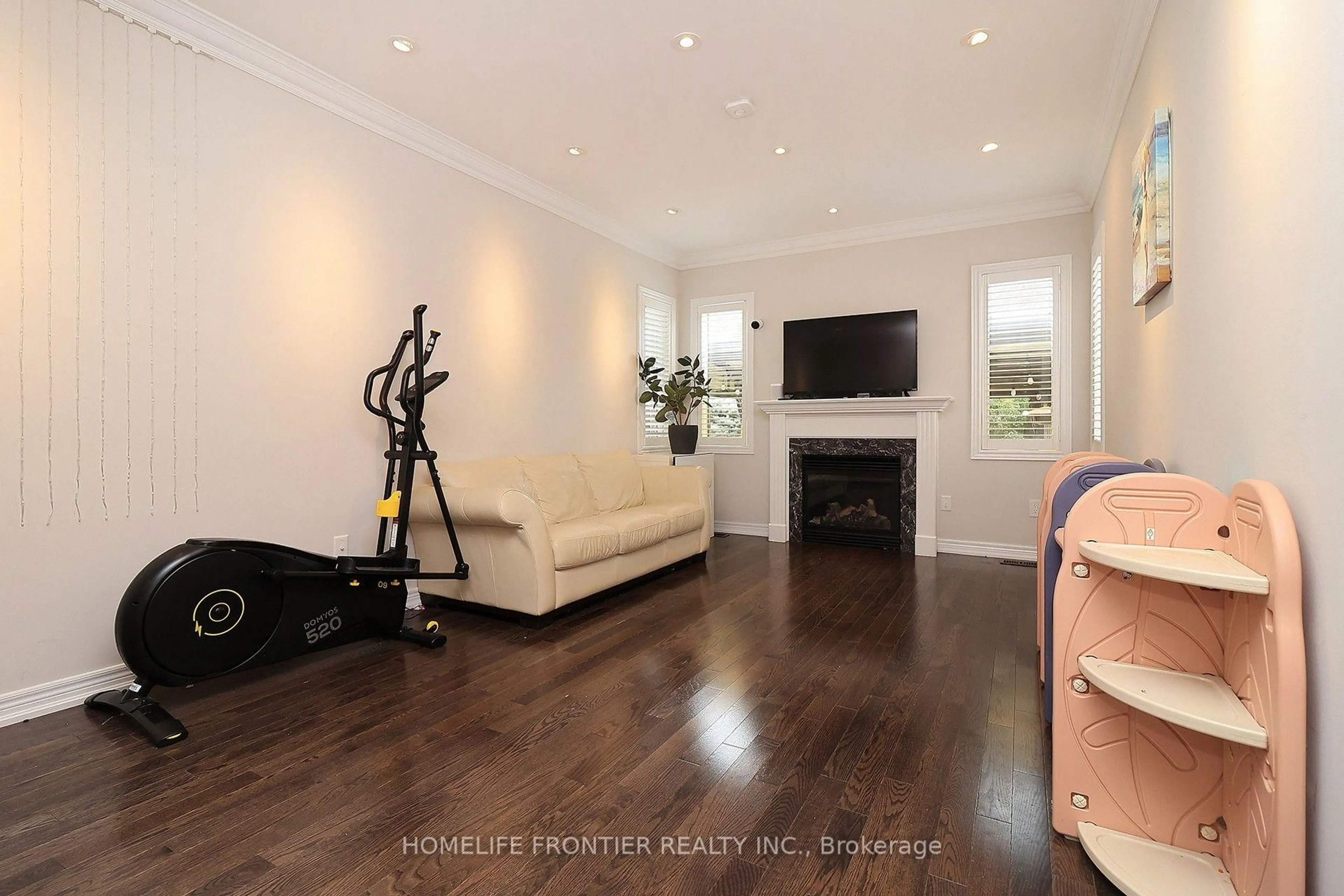 Living room with furniture, wood/laminate floor for 56 Twin Hills Cres, Vaughan Ontario L4H 0G7