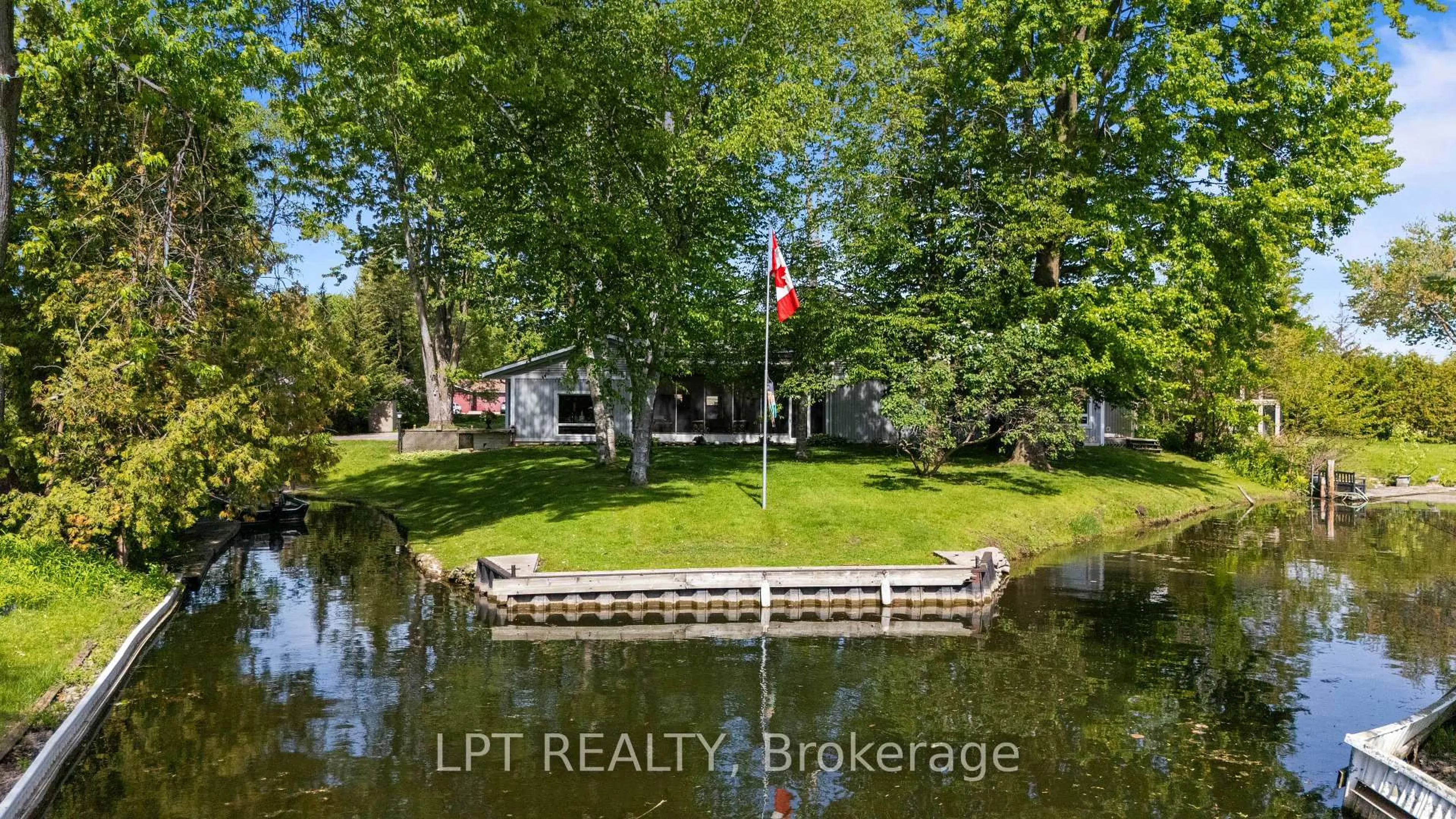A pic from outside/outdoor area/front of a property/back of a property/a pic from drone, water/lake/river/ocean view for 204 The Queensway, Georgina Ontario L4P 2A6