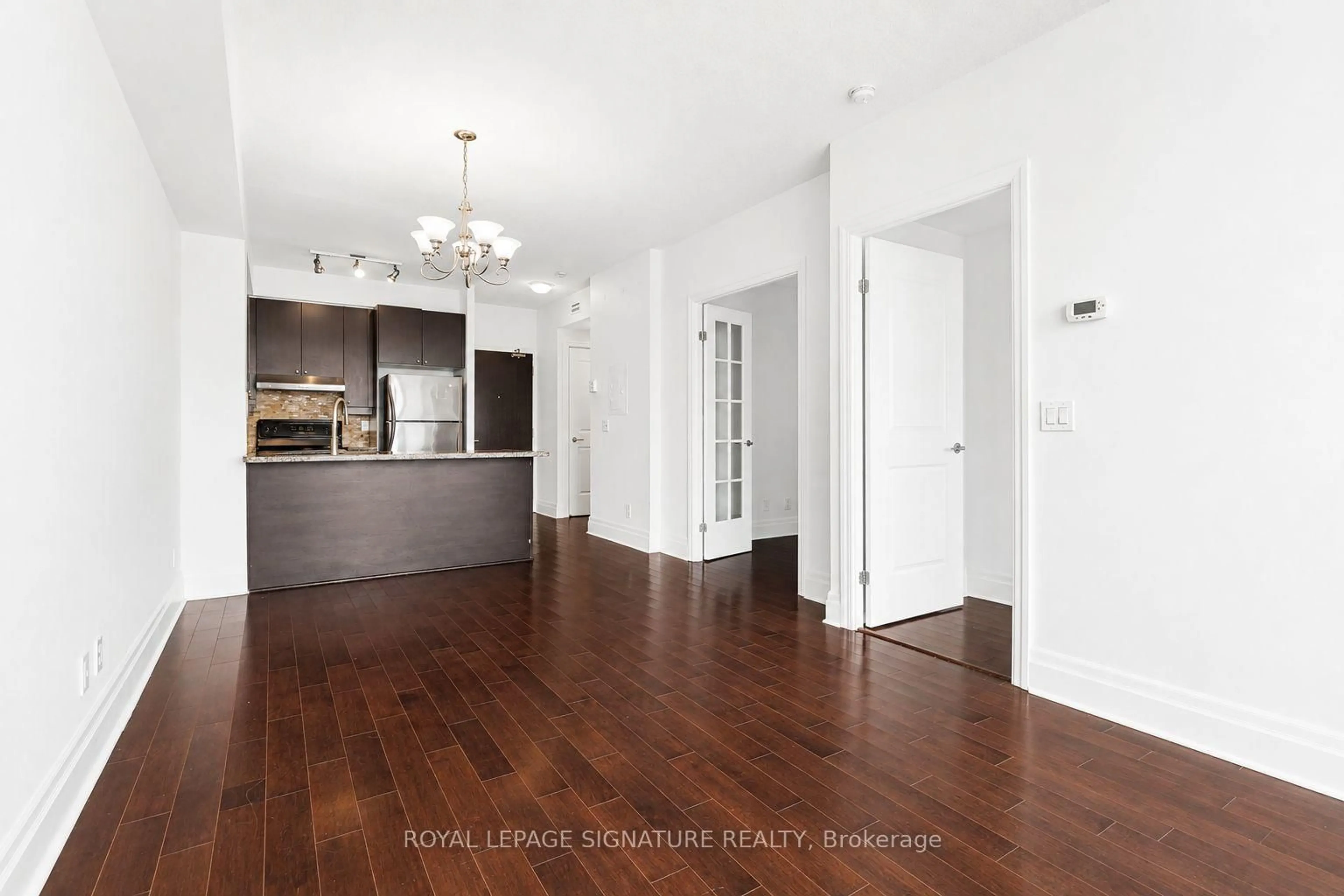 Open concept kitchen, wood/laminate floor for 39 Upper Duke Cres #408, Markham Ontario L6G 0B8