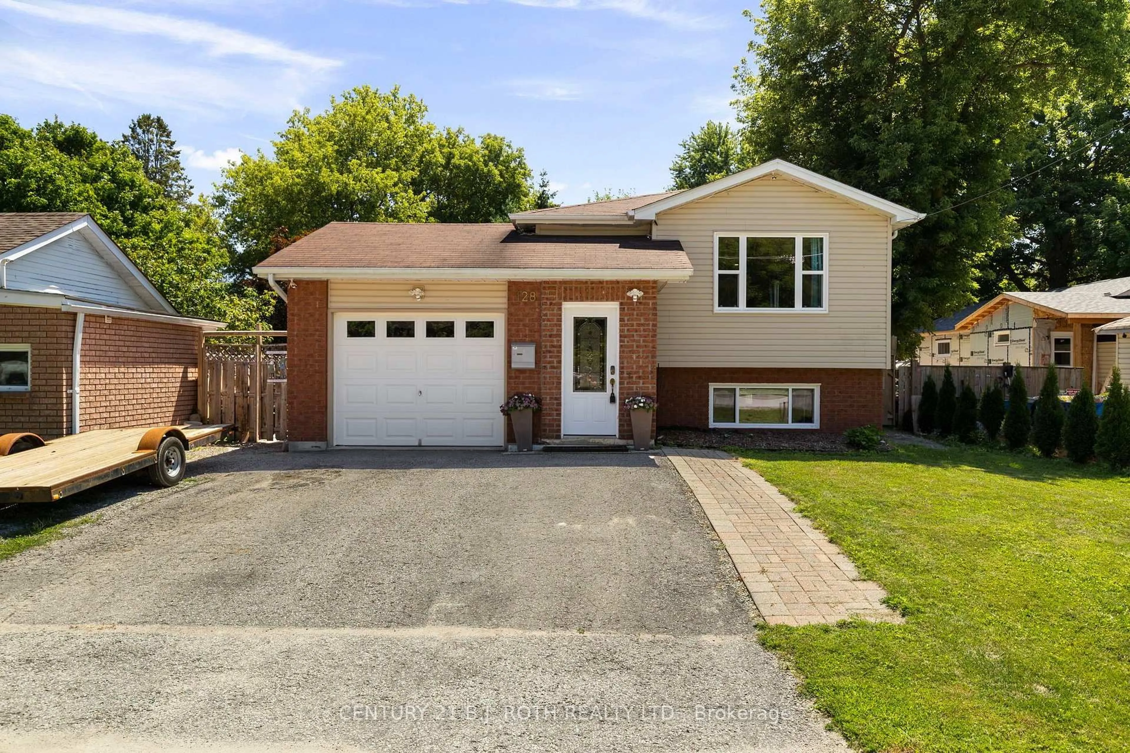 Home with brick exterior material, street for 128 Queen St, Essa Ontario L0M 1B0