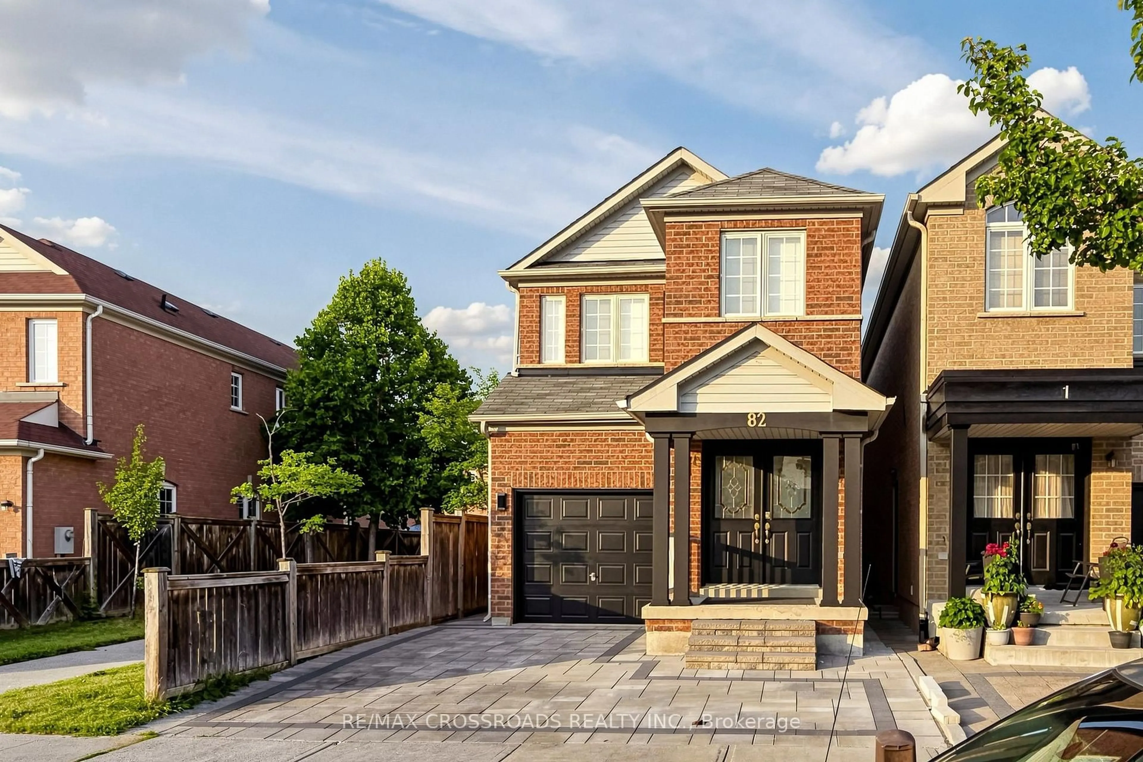 Home with brick exterior material, street for 82 Jack Monkman Cres, Markham Ontario L3S 0A4
