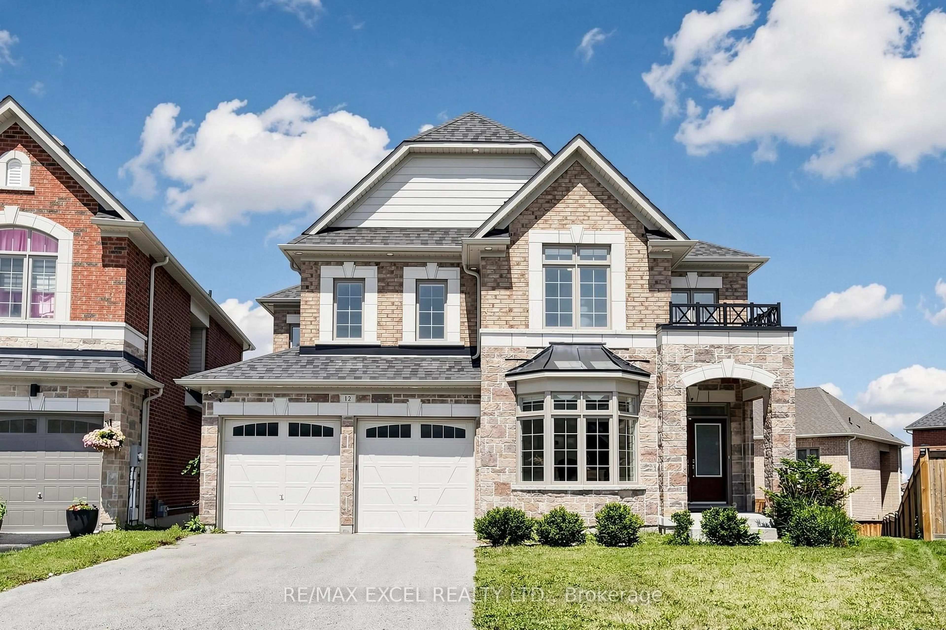 Home with brick exterior material, street for 12 Acacia Crt, East Gwillimbury Ontario L9N 0V2