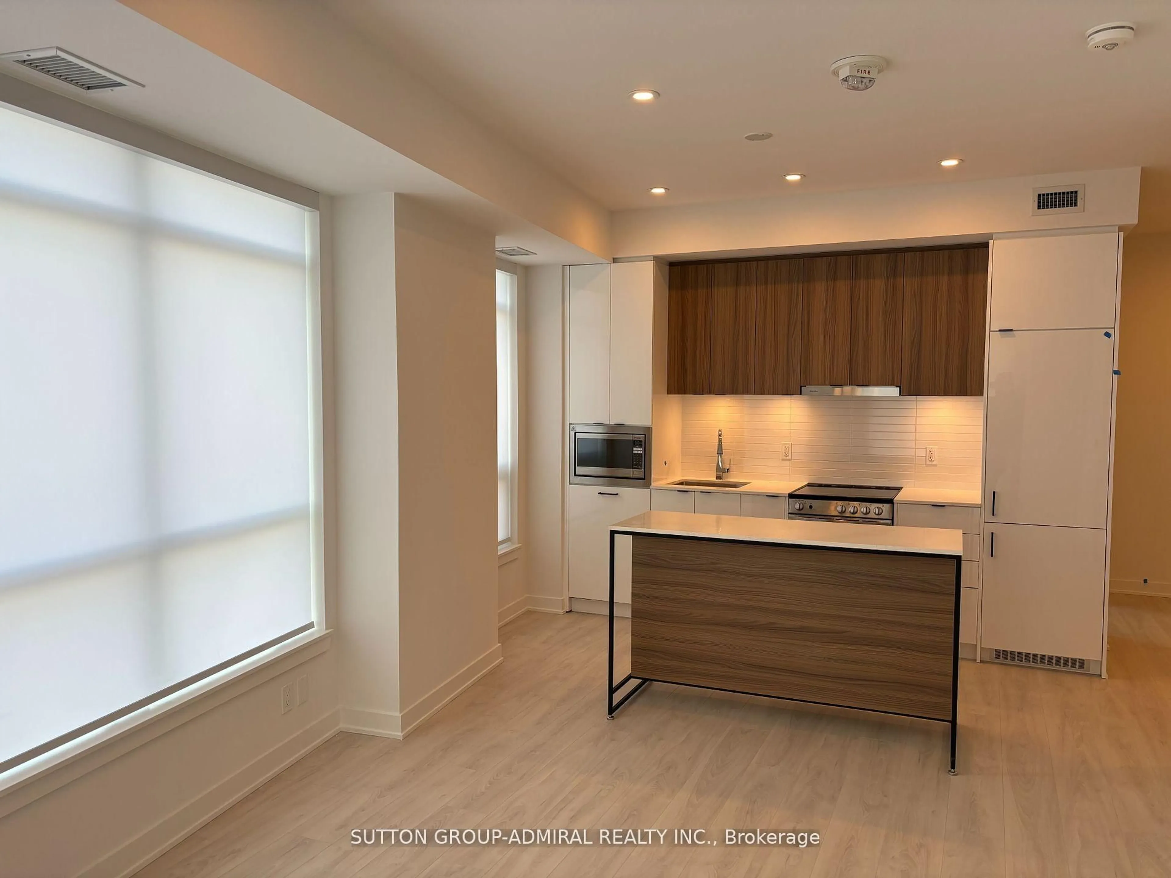 Open concept kitchen, wood/laminate floor for 30 Upper Mall Way #A1505, Vaughan Ontario L4J 0L7