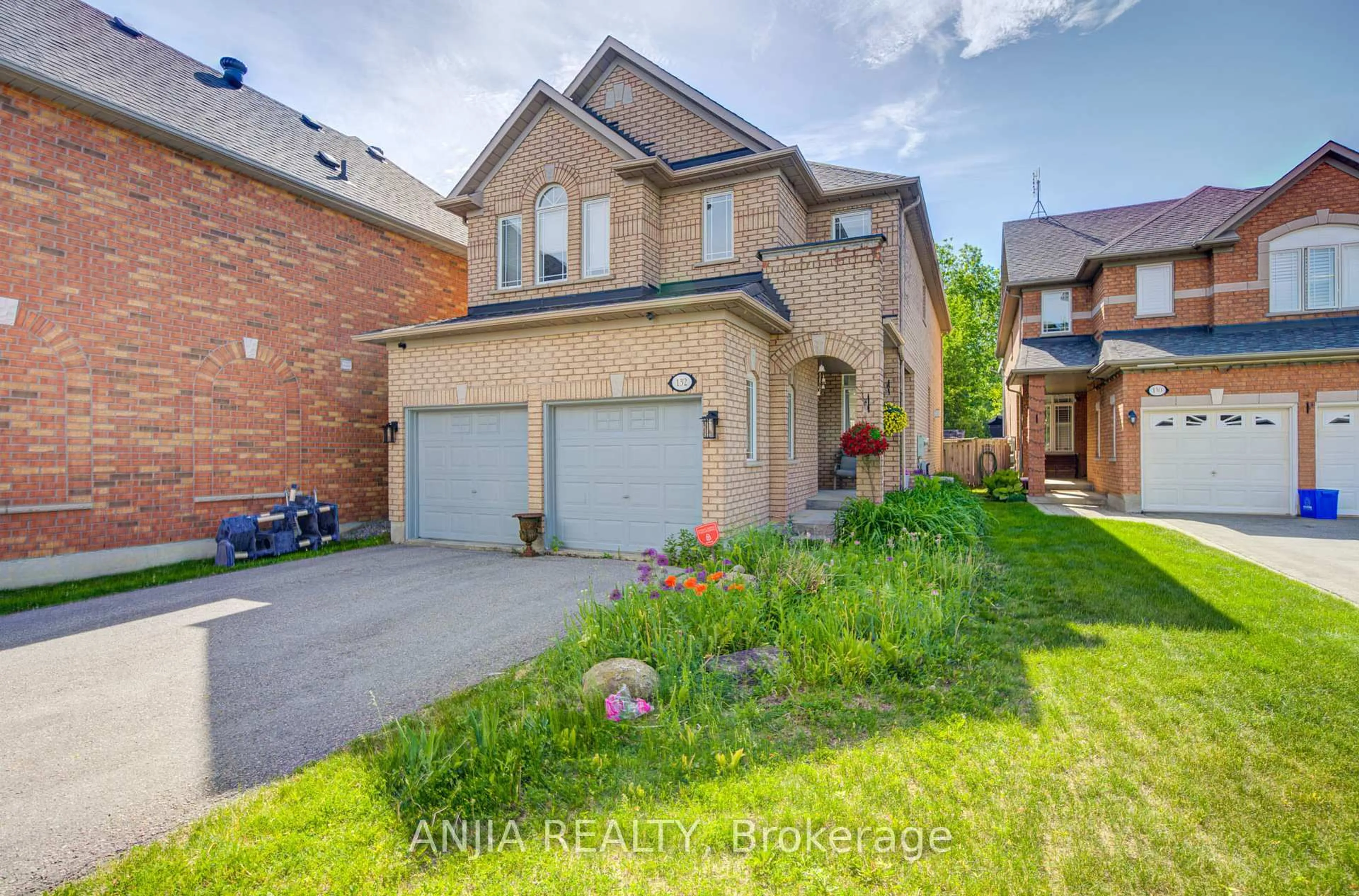 Home with brick exterior material, street for 132 Estate Garden Dr, Richmond Hill Ontario L4E 3X8
