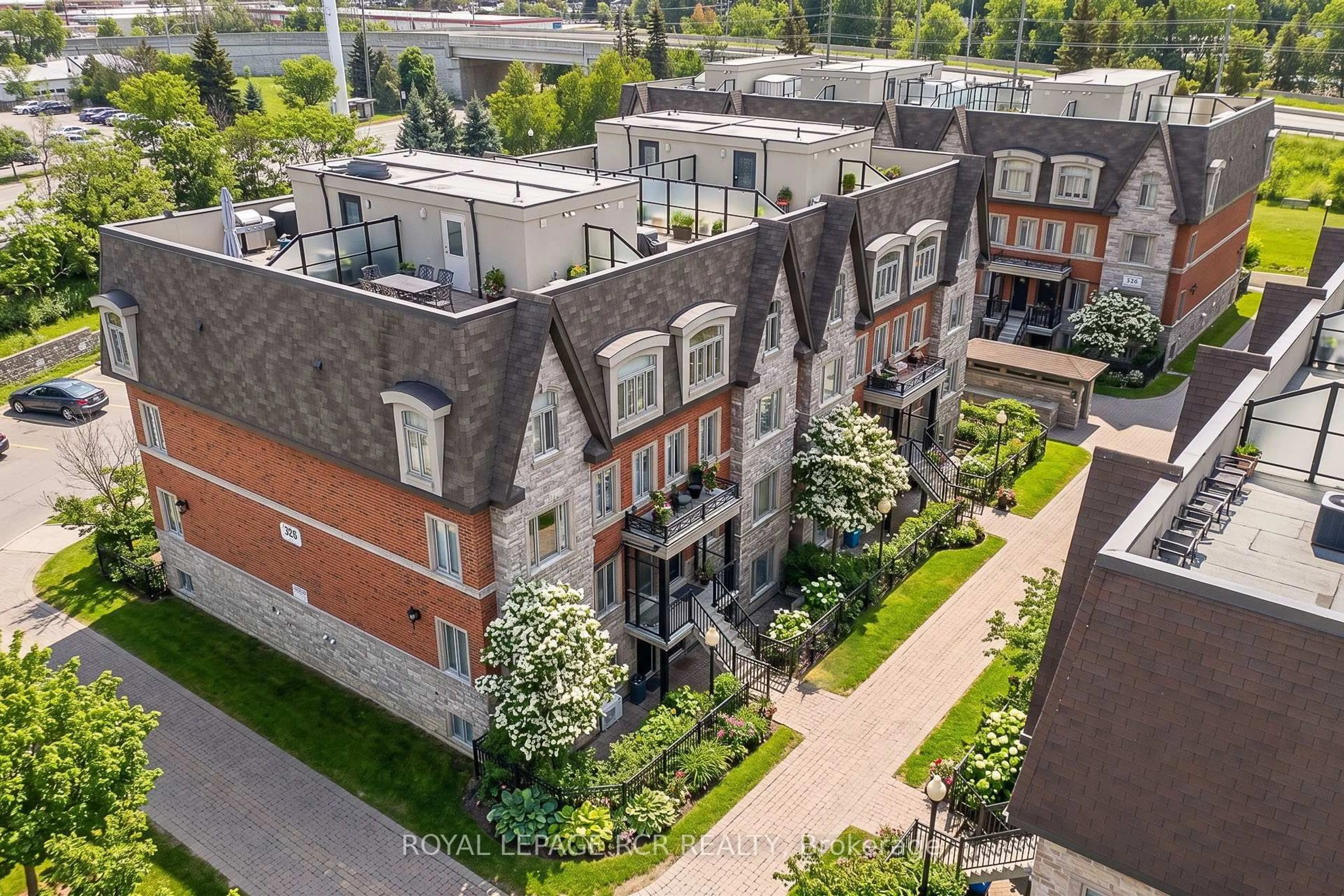 A pic from outside/outdoor area/front of a property/back of a property/a pic from drone, city buildings view from balcony for 326 John St #138, Markham Ontario L3T 0B1