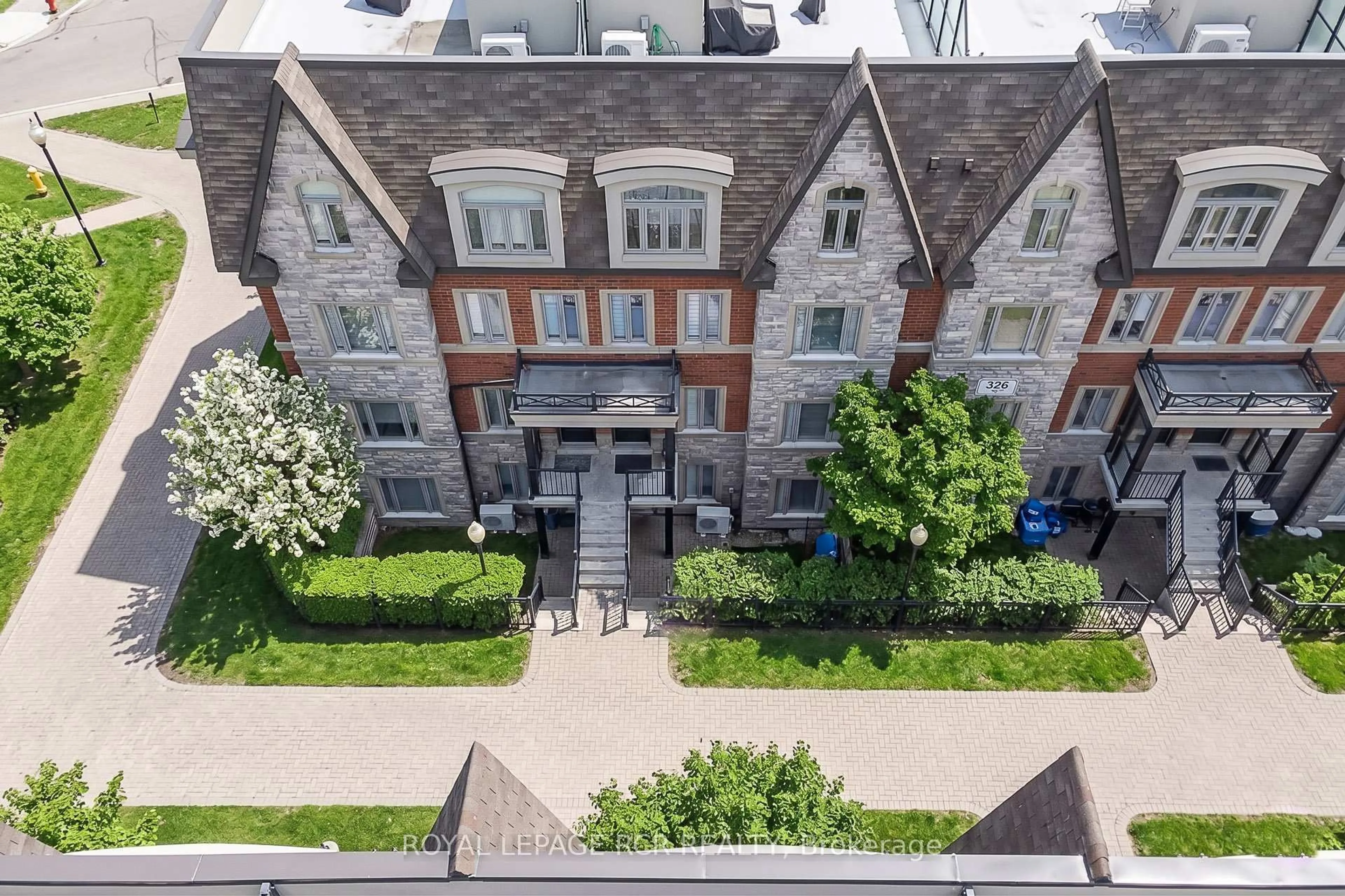 A pic from outside/outdoor area/front of a property/back of a property/a pic from drone, city buildings view from balcony for 326 John St #138, Markham Ontario L3T 0B1