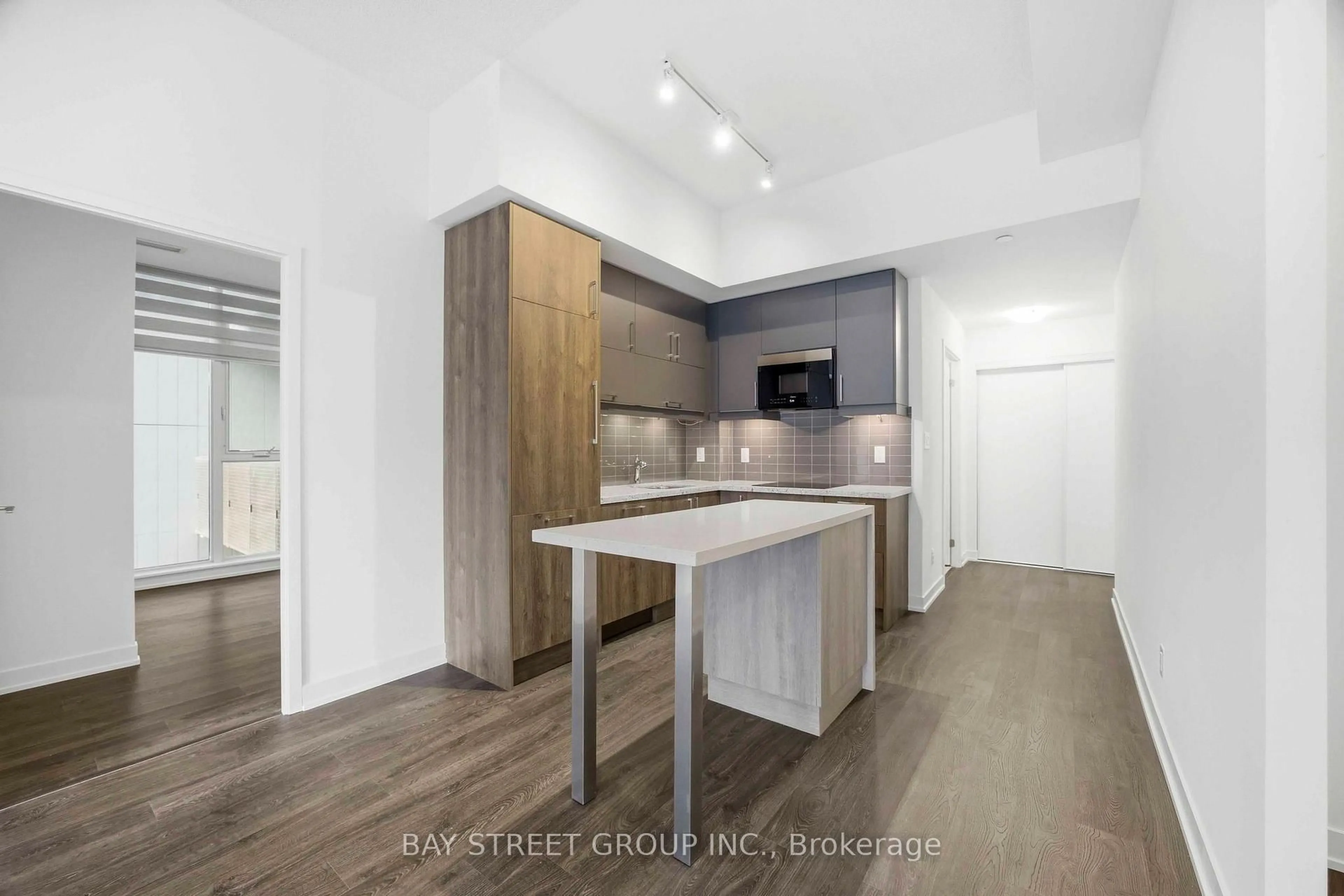 Open concept kitchen, wood/laminate floor for 8119 Birchmount Rd #1020, Markham Ontario L6G 0H5