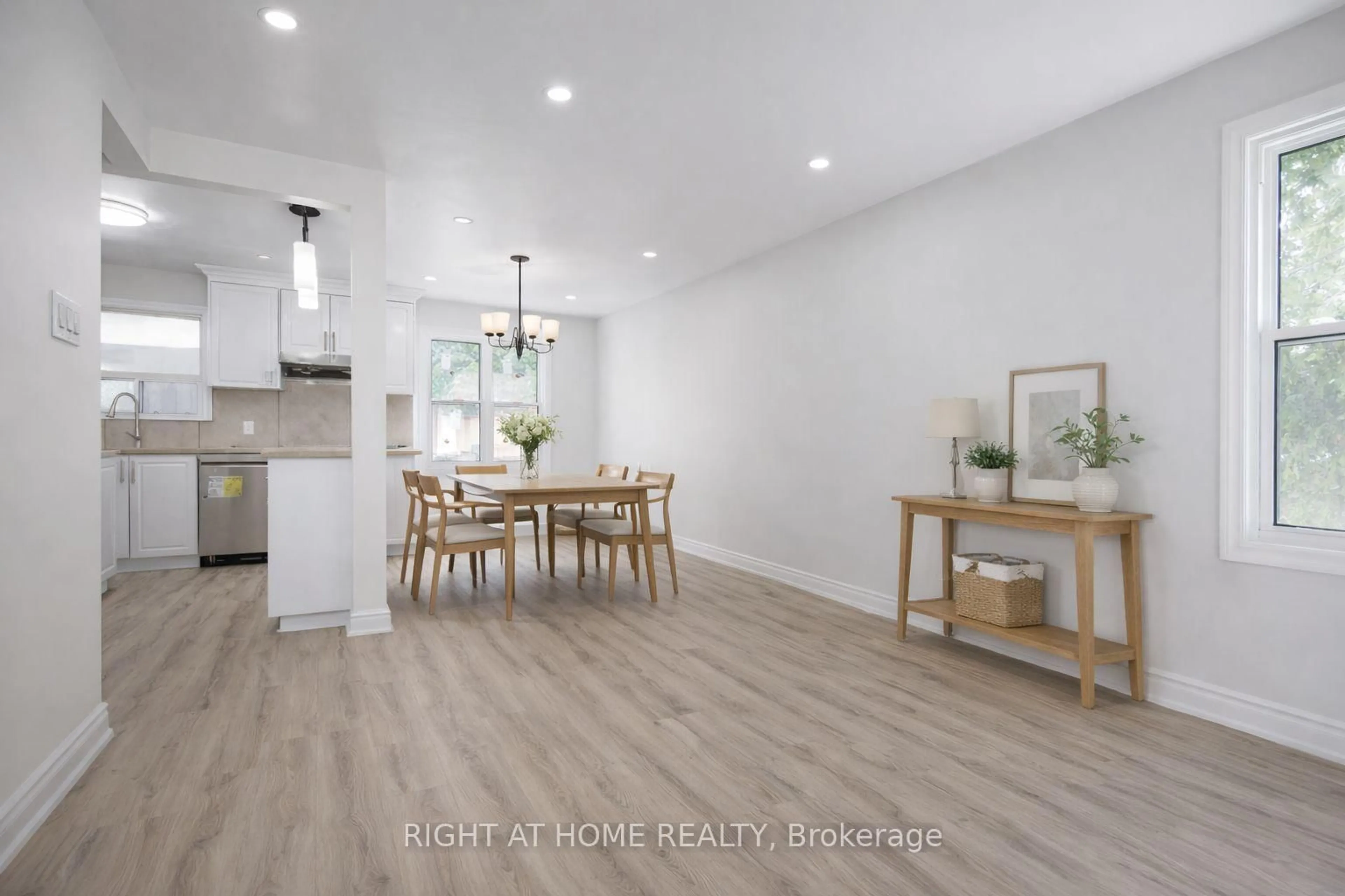 Open concept kitchen, wood/laminate floor for 225 Essex Ave, Richmond Hill Ontario L4C 2C1