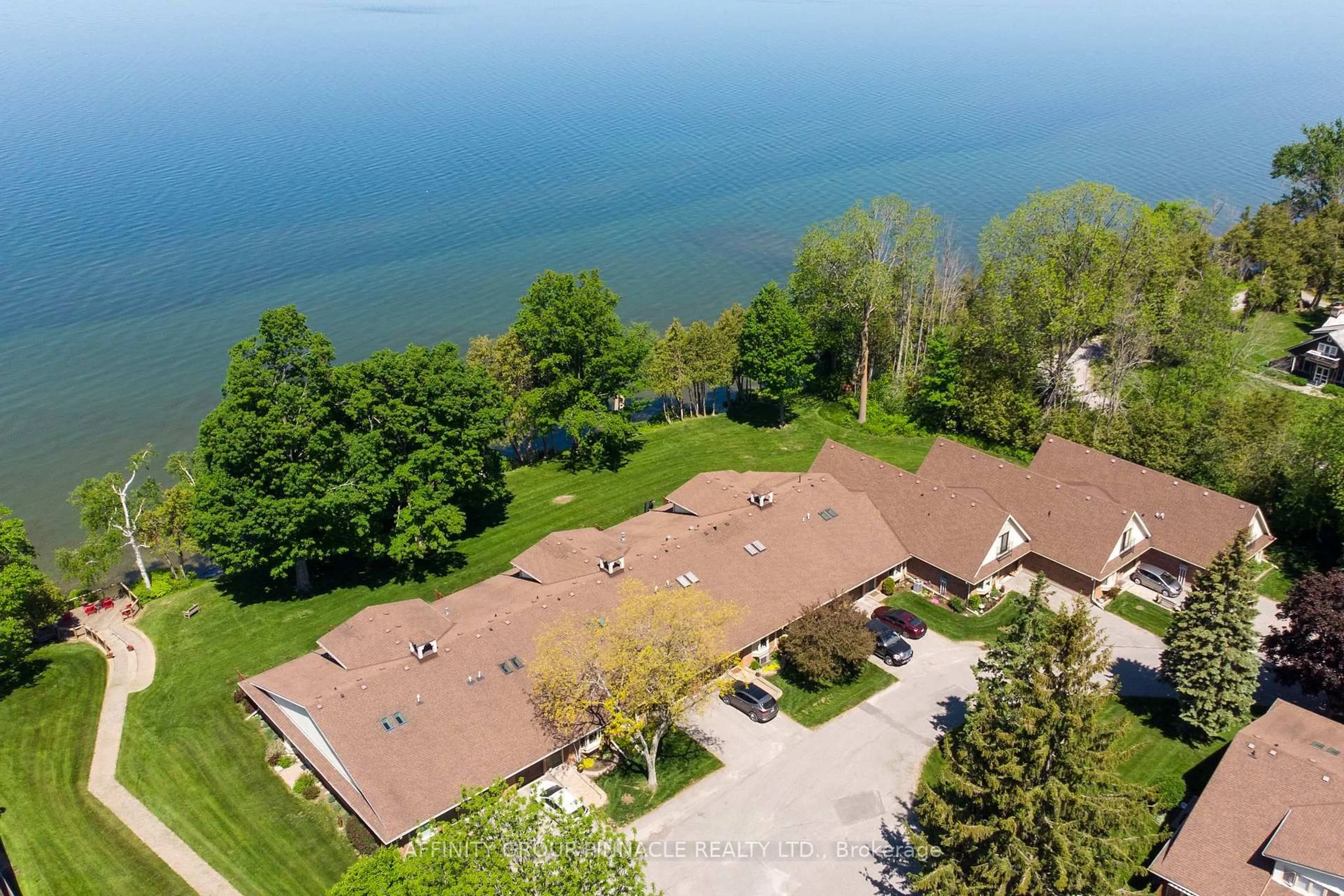 A pic from outside/outdoor area/front of a property/back of a property/a pic from drone, water/lake/river/ocean view for 90 Parklawn Blvd #1, Brock Ontario L0K 1A0