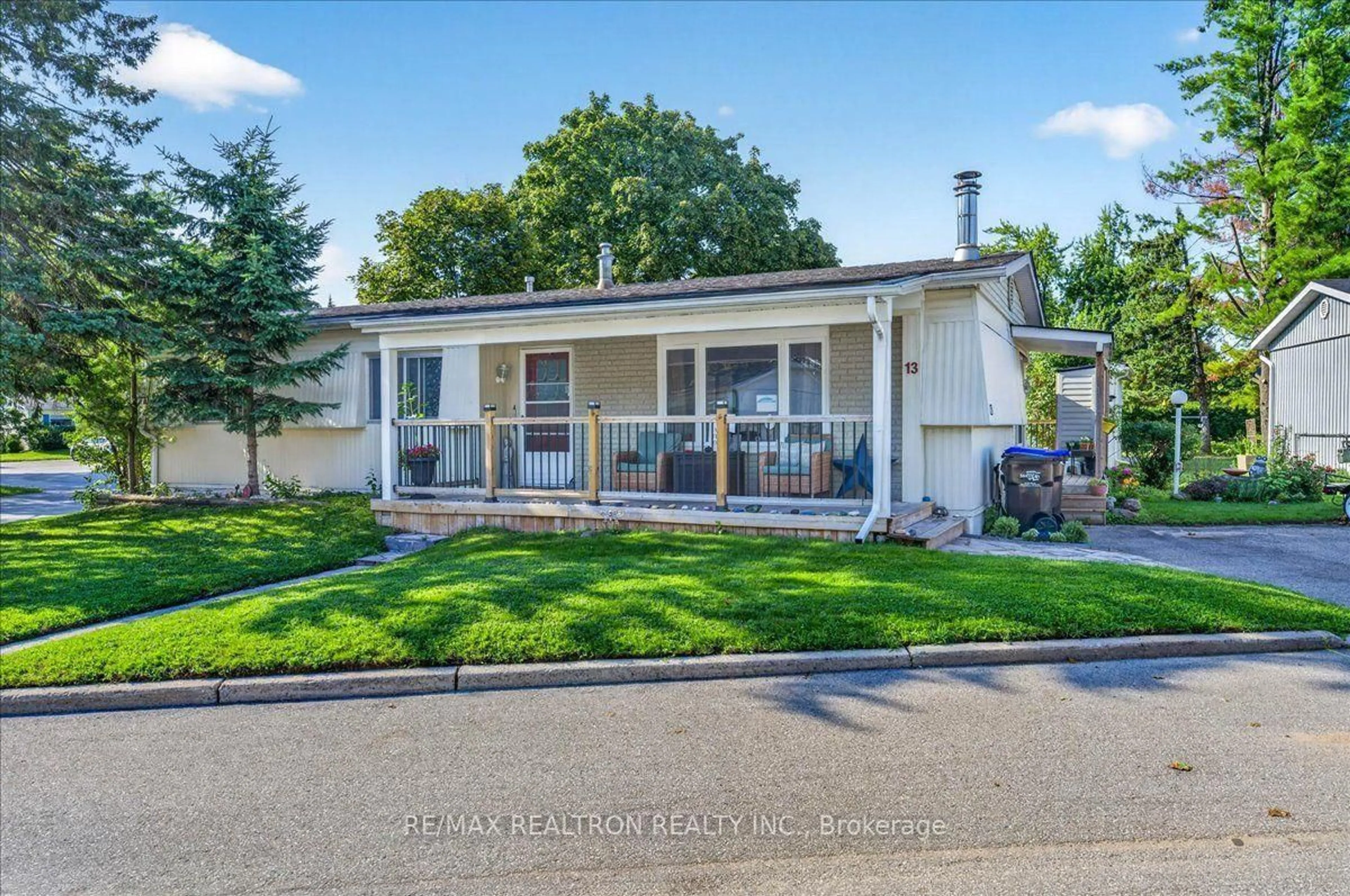 Home with vinyl exterior material, street for 13 Broadway Ave, Innisfil Ontario L9S 1N9
