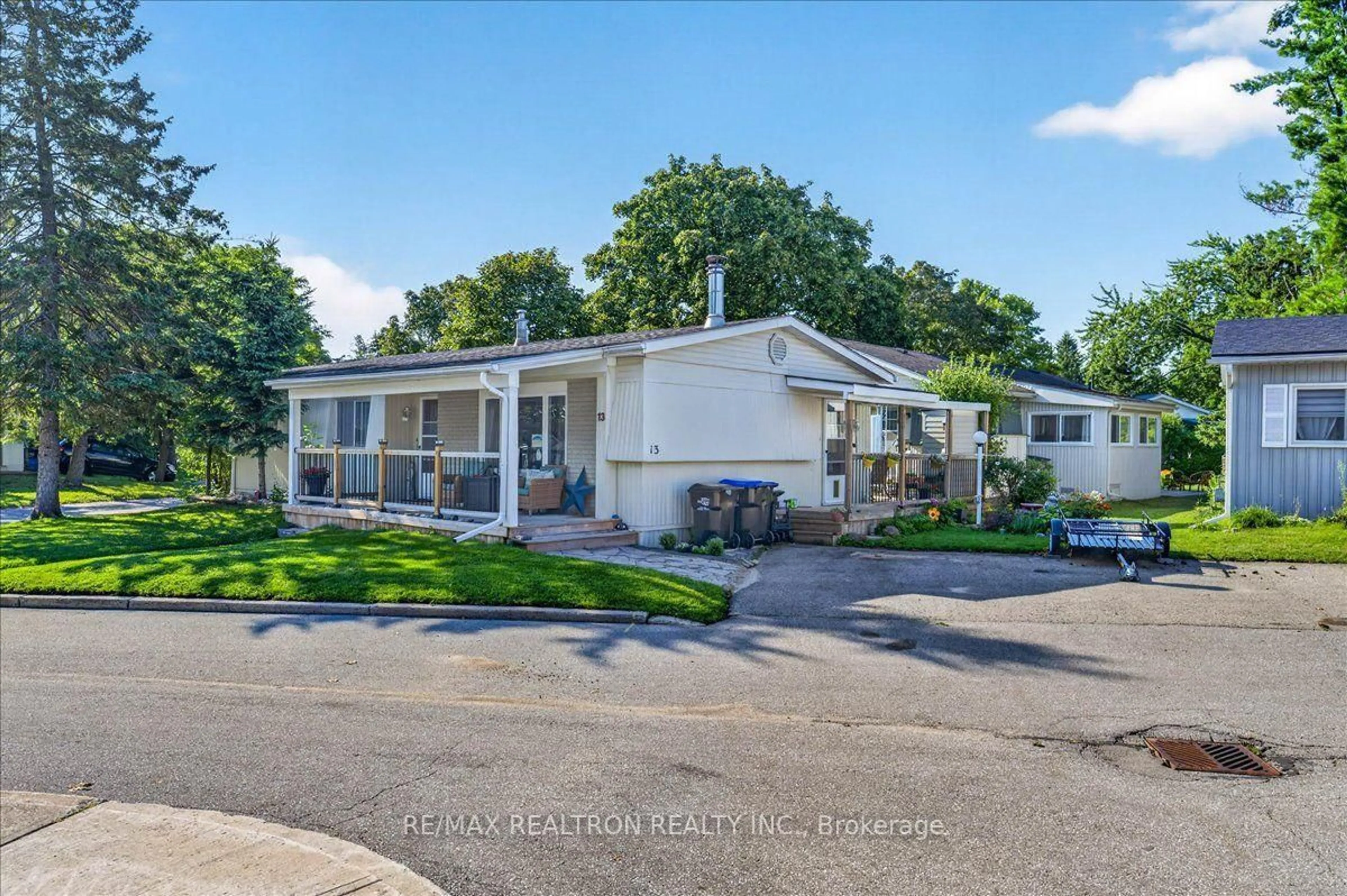 Home with vinyl exterior material, street for 13 Broadway Ave, Innisfil Ontario L9S 1N9