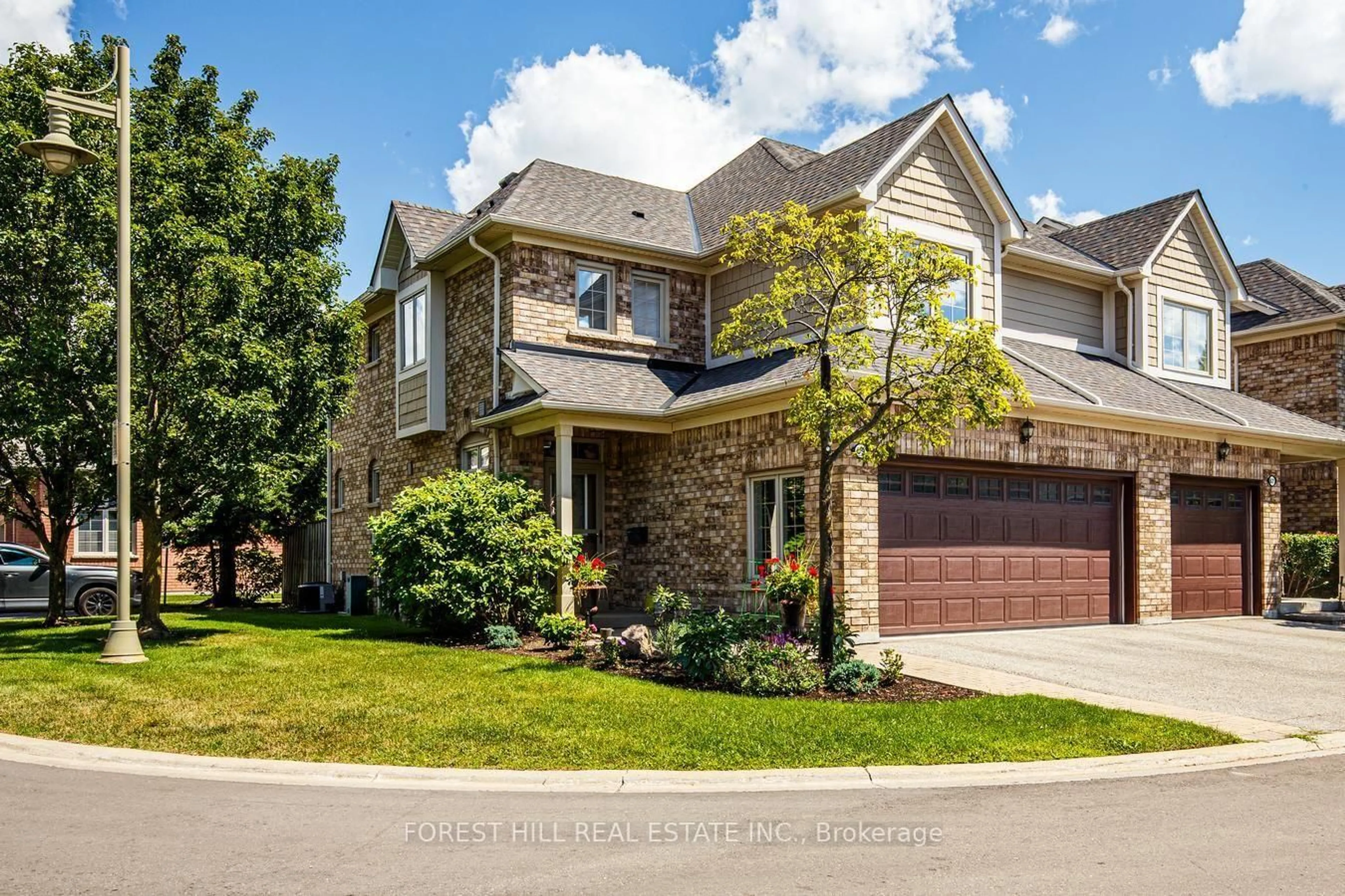 Home with brick exterior material, street for 69 Louisbourg Way, Markham Ontario L6E 2A2