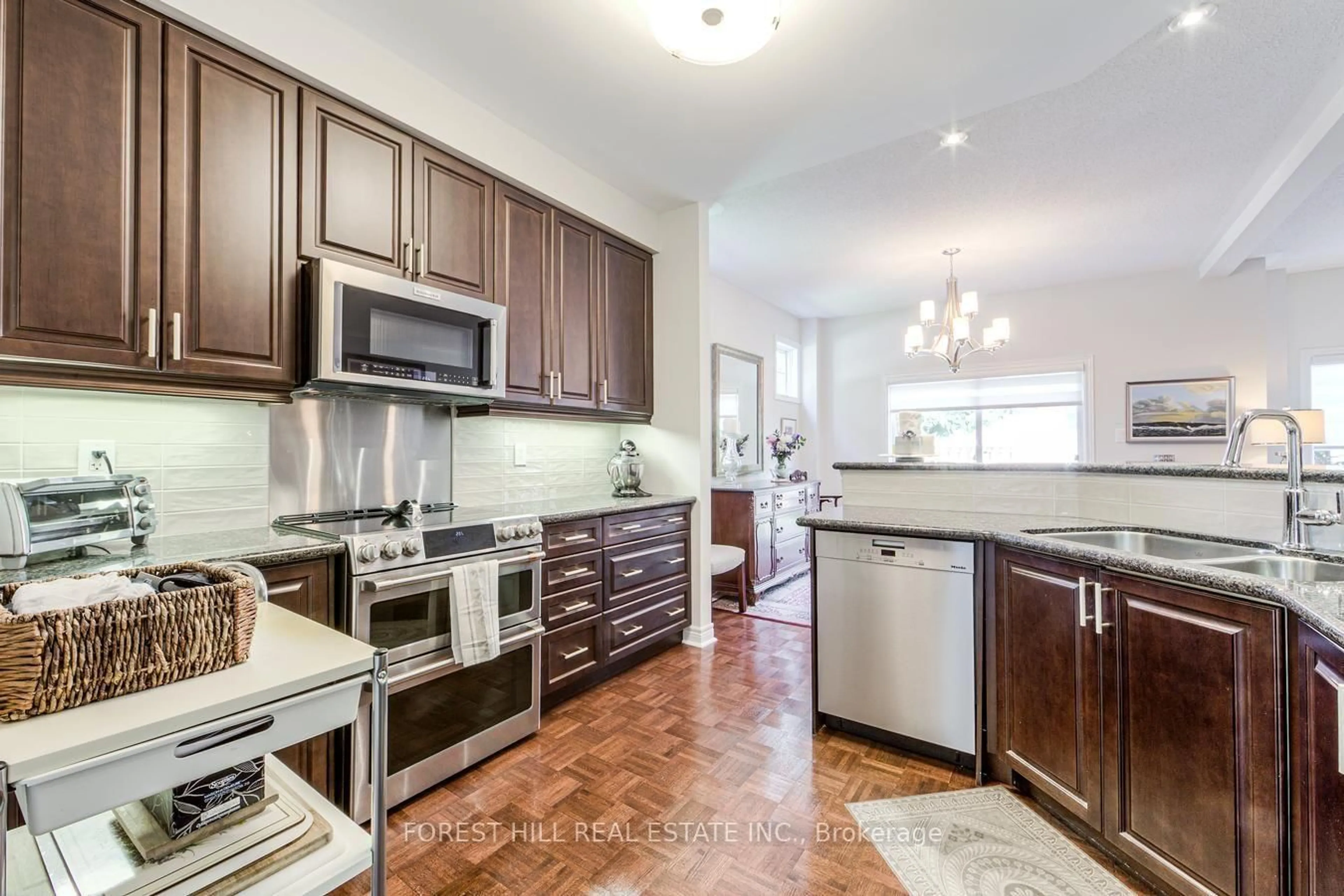 Open concept kitchen, unknown for 69 Louisbourg Way, Markham Ontario L6E 2A2