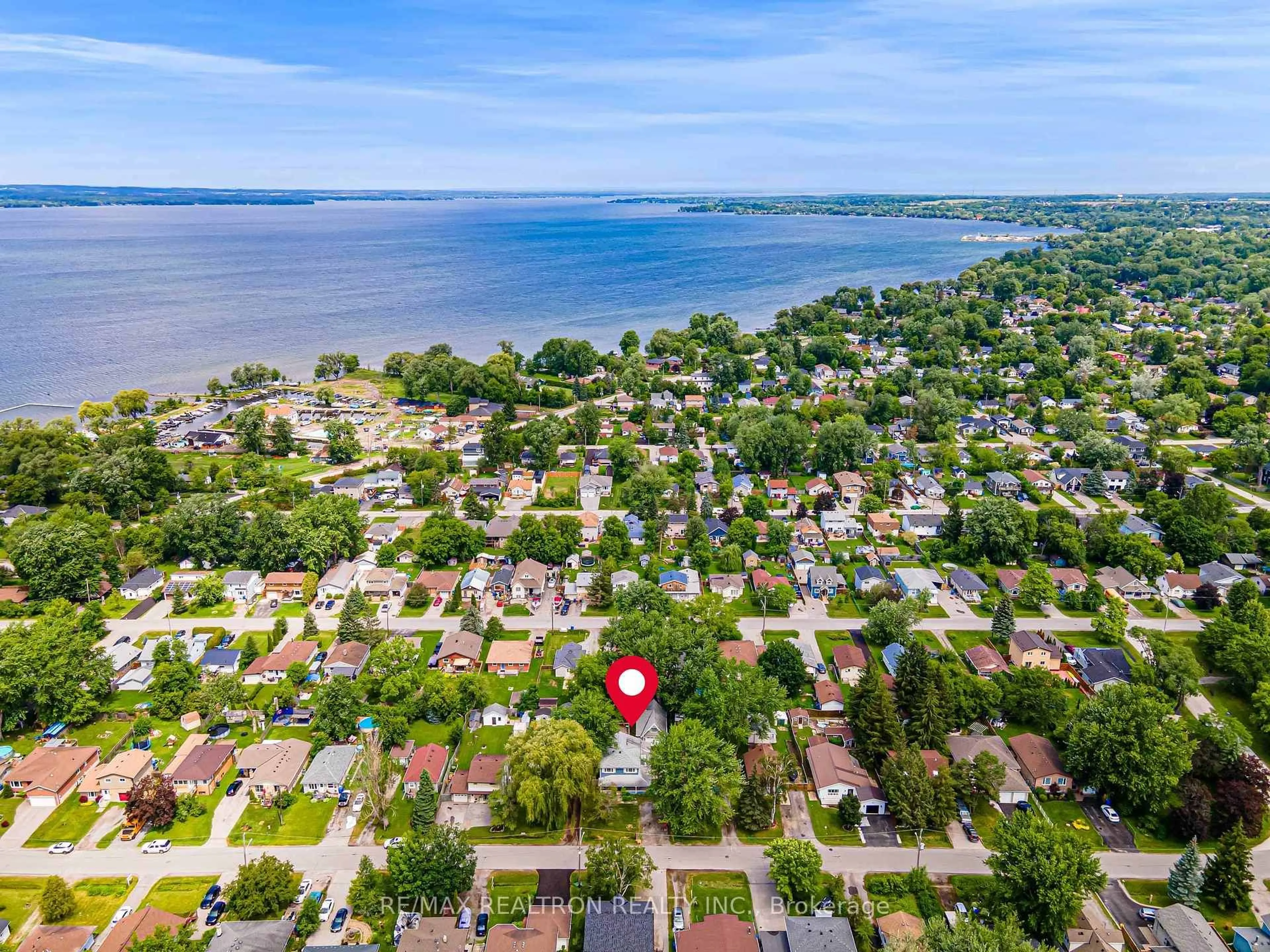 A pic from outside/outdoor area/front of a property/back of a property/a pic from drone, water/lake/river/ocean view for 330 Tampa Dr, Georgina Ontario L4P 3A4