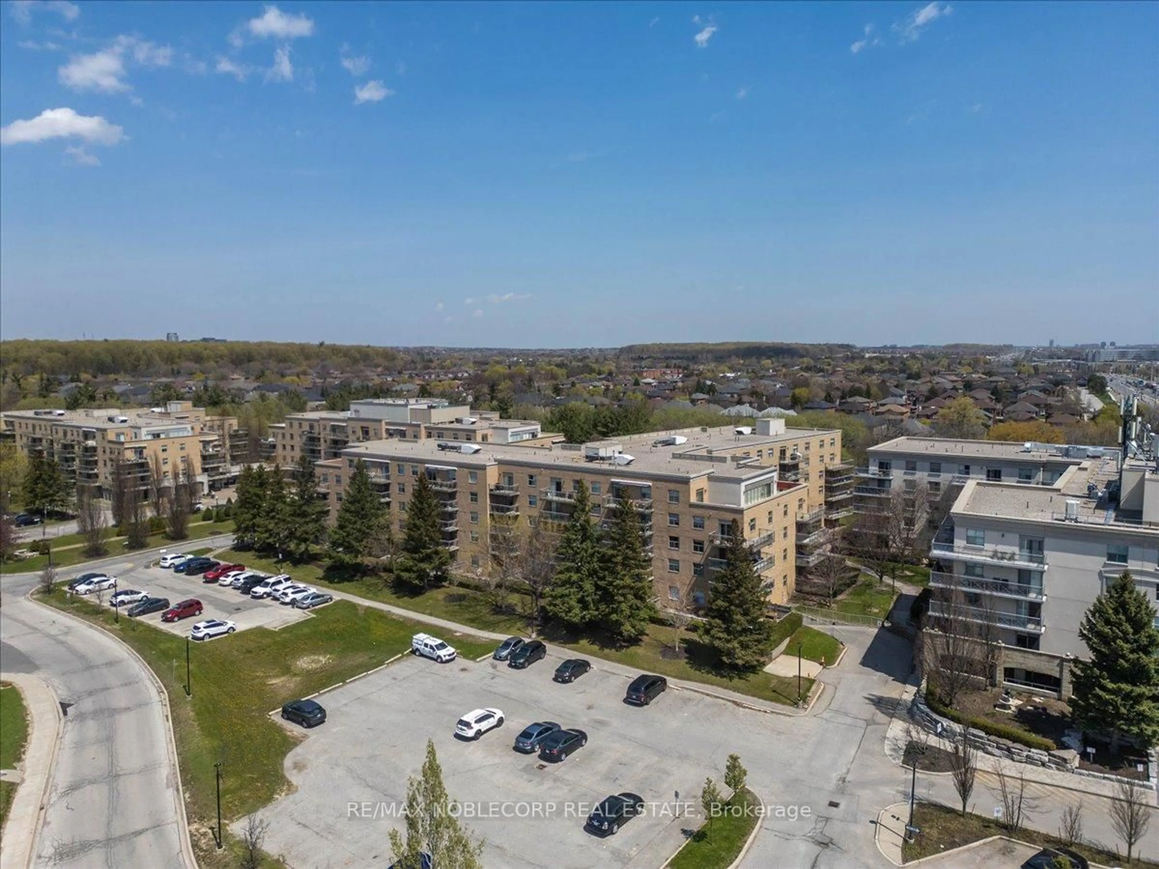 A pic from outside/outdoor area/front of a property/back of a property/a pic from drone, unknown for 2502 Rutherford Rd #111, Vaughan Ontario L4K 5N6