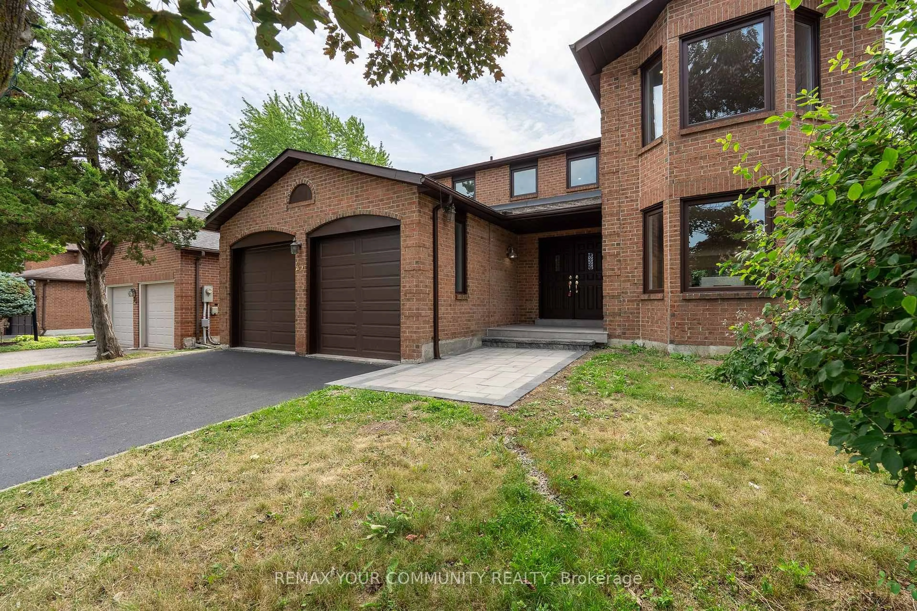 Home with brick exterior material, street for 27 Houseman Cres, Richmond Hill Ontario L4C 7S3