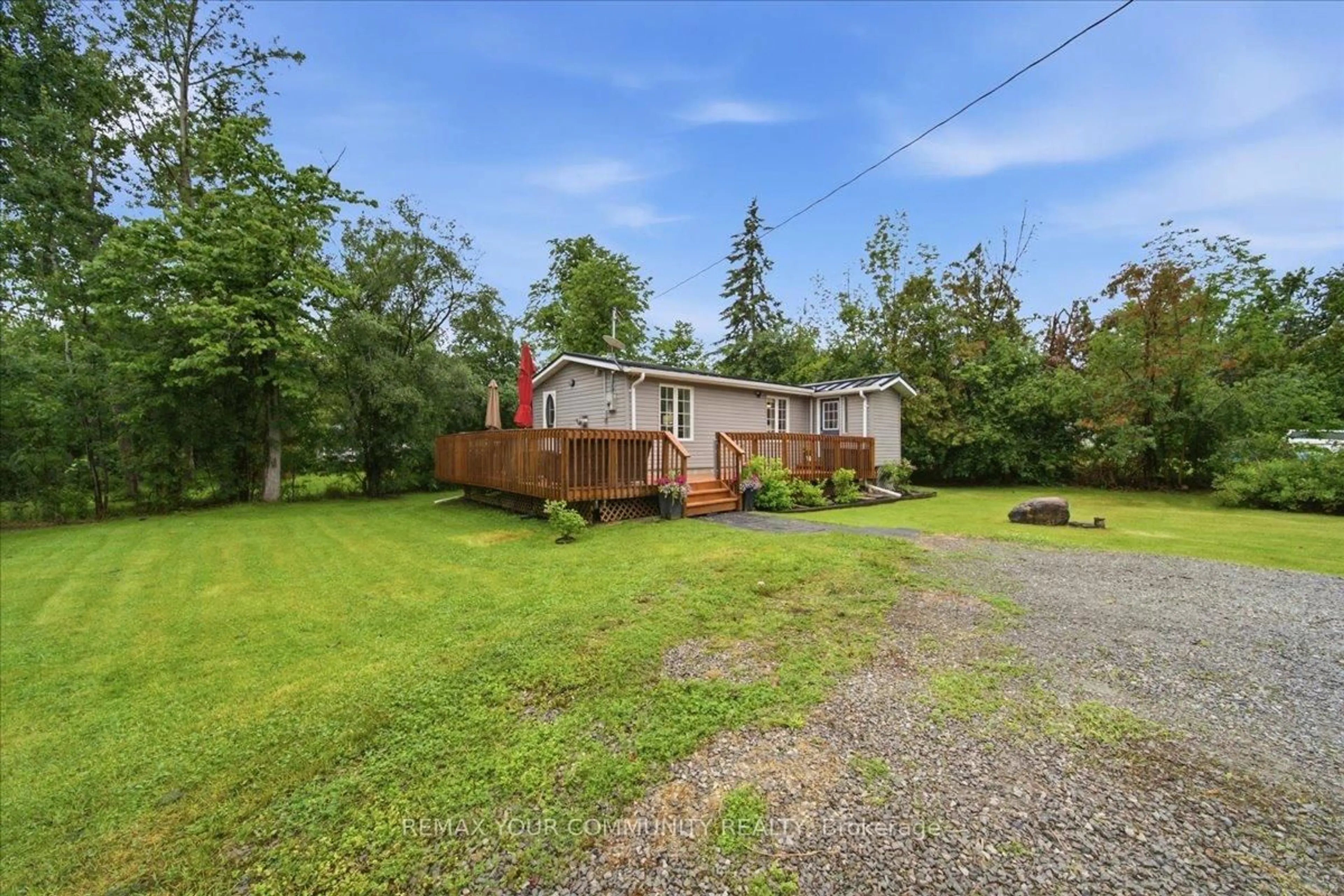 A pic from outside/outdoor area/front of a property/back of a property/a pic from drone, water/lake/river/ocean view for 25246 Commodore Rd, Brock Ontario L0K 1A0