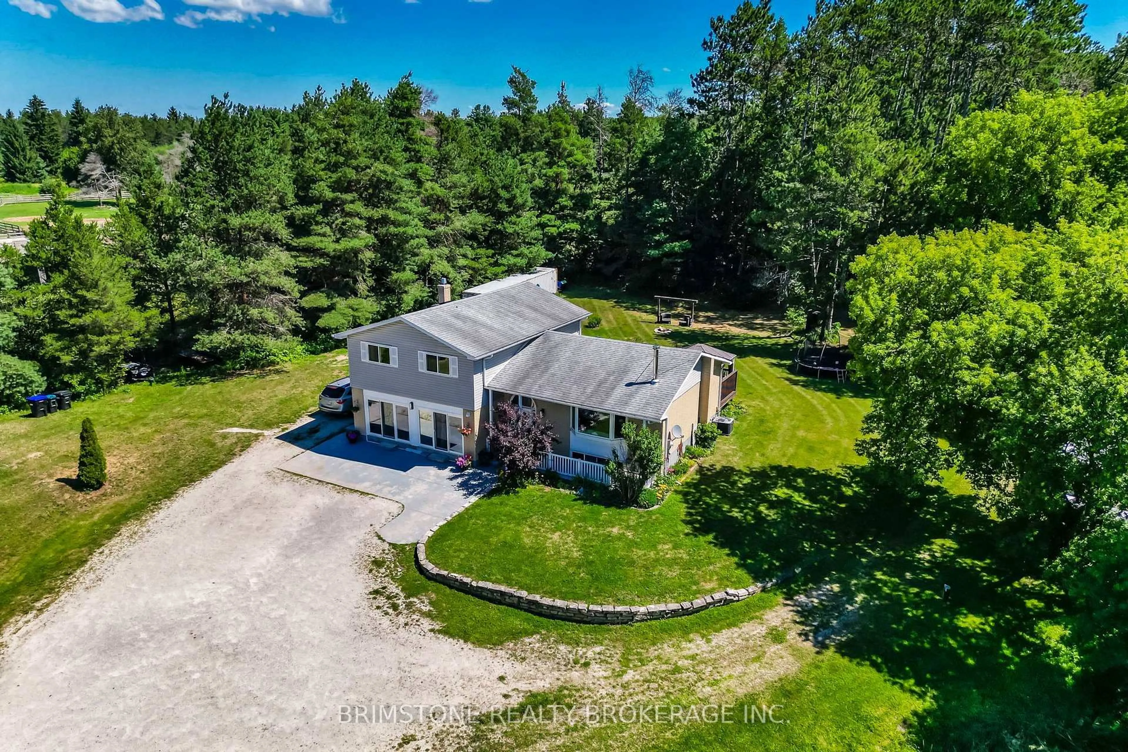A pic from outside/outdoor area/front of a property/back of a property/a pic from drone, unknown for 8231 56 County Rd, Essa Ontario L0M 1T0