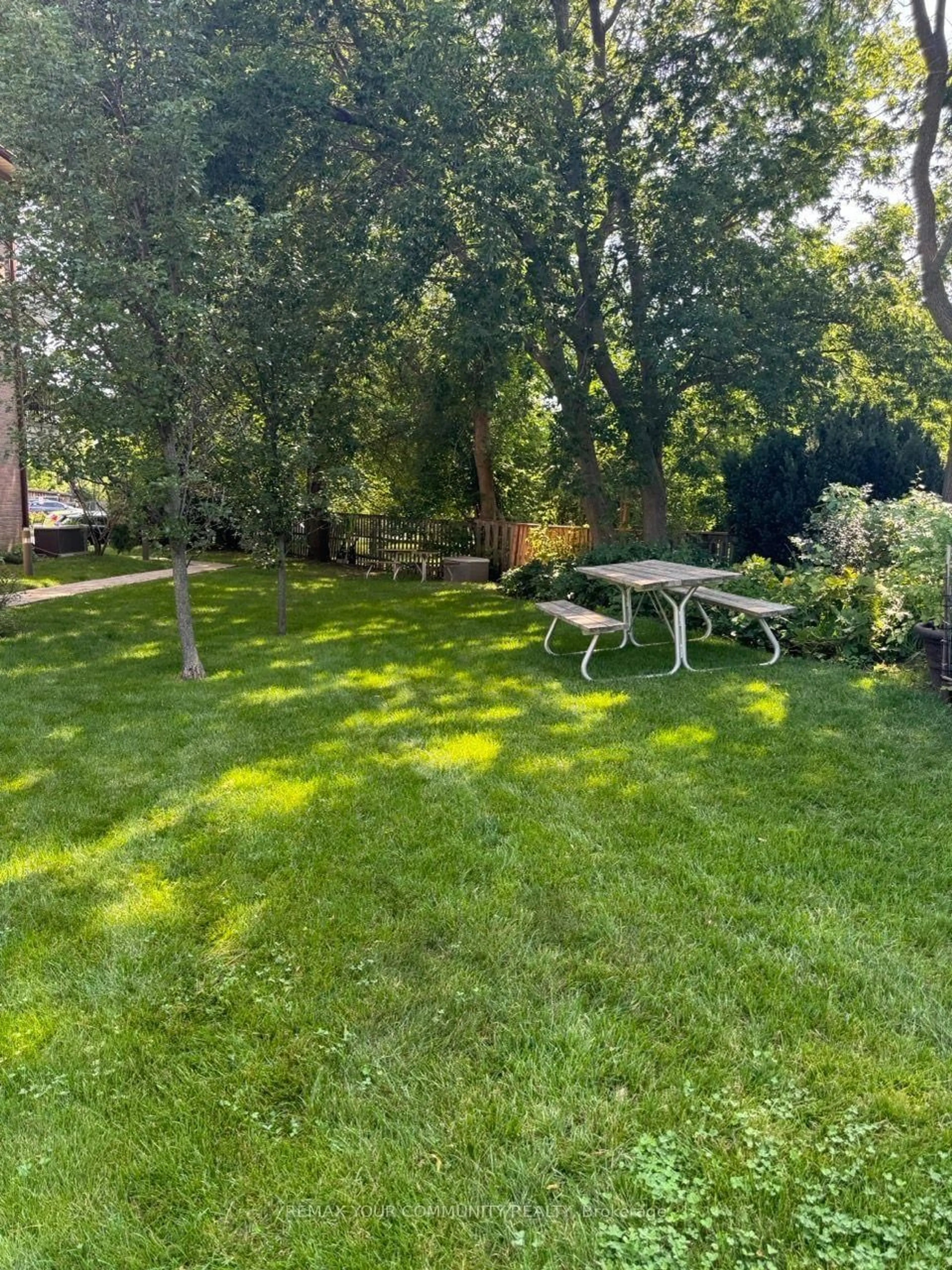 Patio, forest/trees view for 111 Grew Blvd #104, Georgina Ontario L0E 1R0