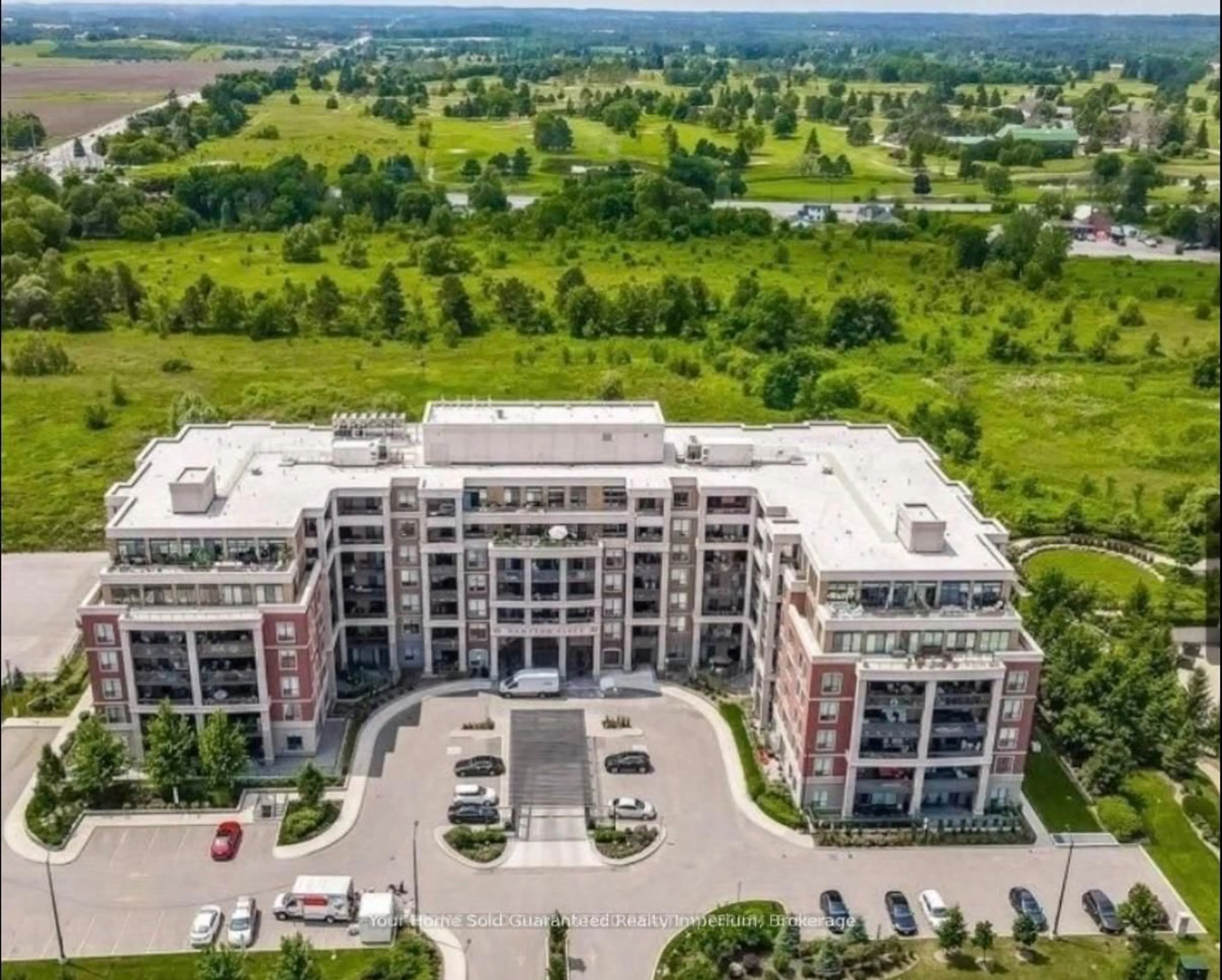A pic from outside/outdoor area/front of a property/back of a property/a pic from drone, building for 25 Baker Hill Blvd #610, Whitchurch-Stouffville Ontario L4A 4R5