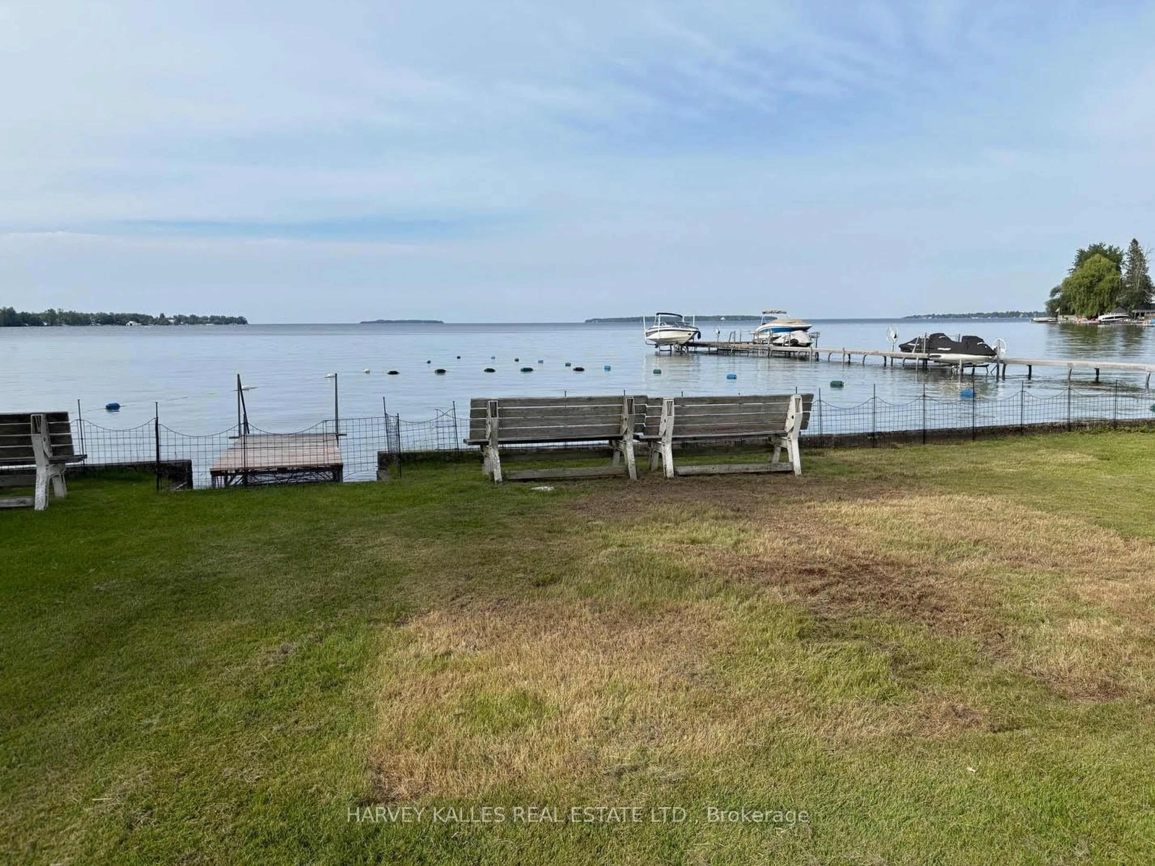 A pic from outside/outdoor area/front of a property/back of a property/a pic from drone, water/lake/river/ocean view for 1139 Claver Ave #9, Innisfil Ontario L0L 1C0