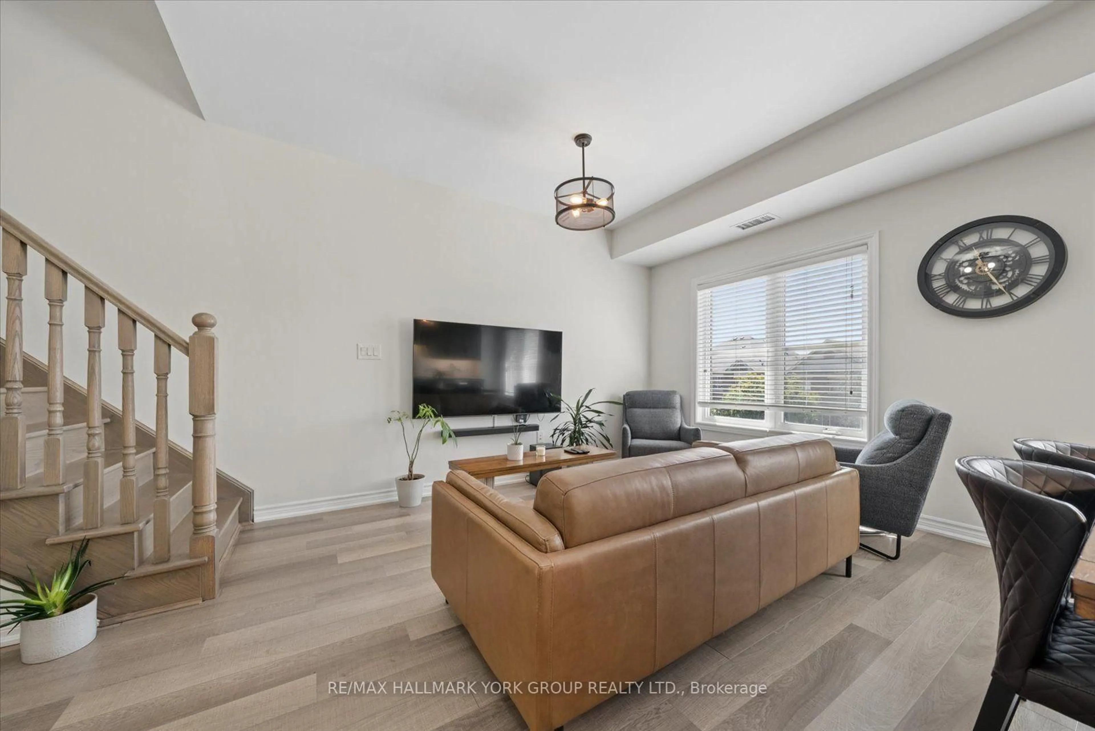 Living room with furniture, unknown for 3905 Major Mackenzie Dr #203, Vaughan Ontario L4L 1A6