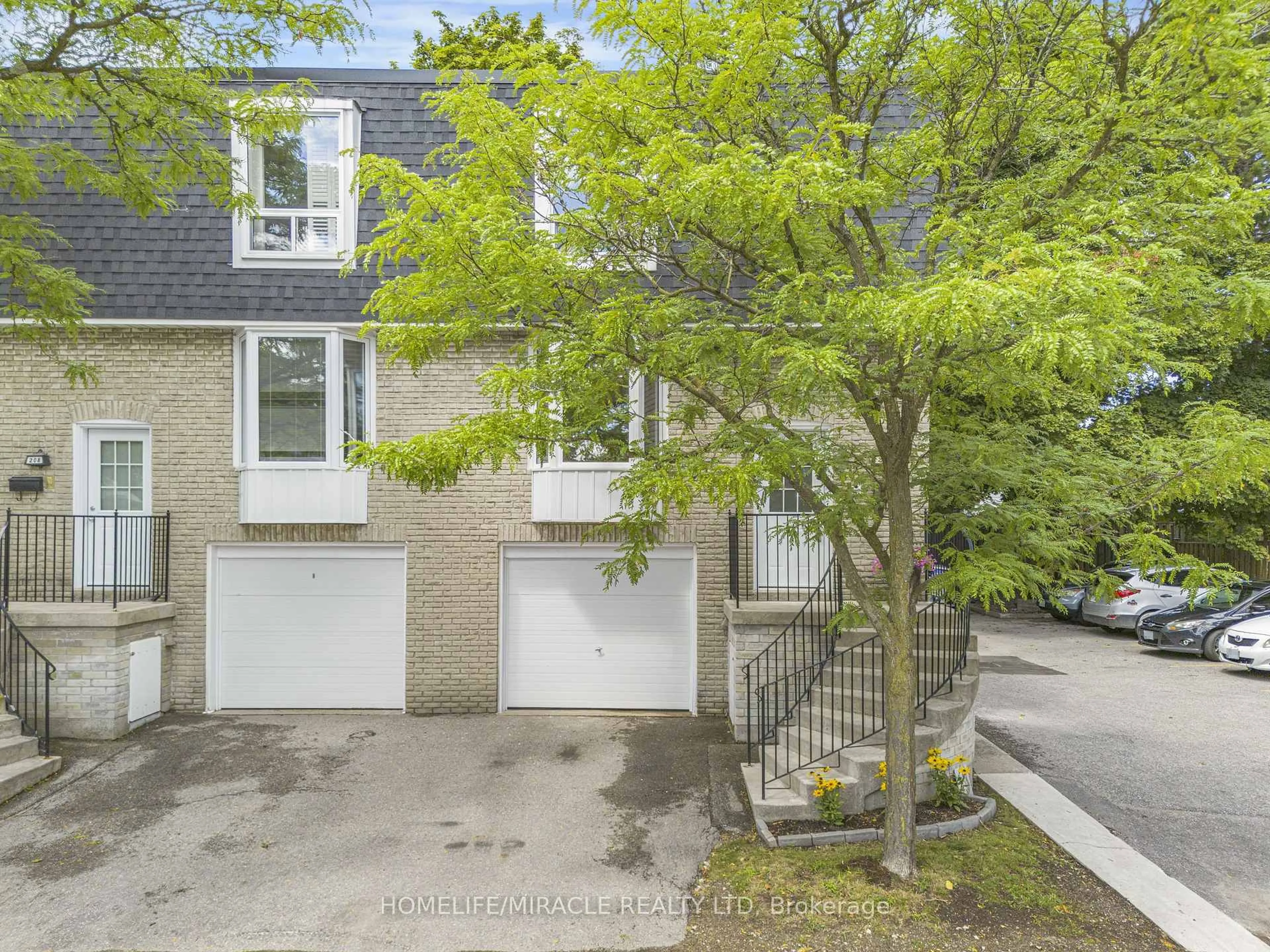A pic from outside/outdoor area/front of a property/back of a property/a pic from drone, street for 210 Royal Orchard Blvd #51, Markham Ontario L3T 3E7