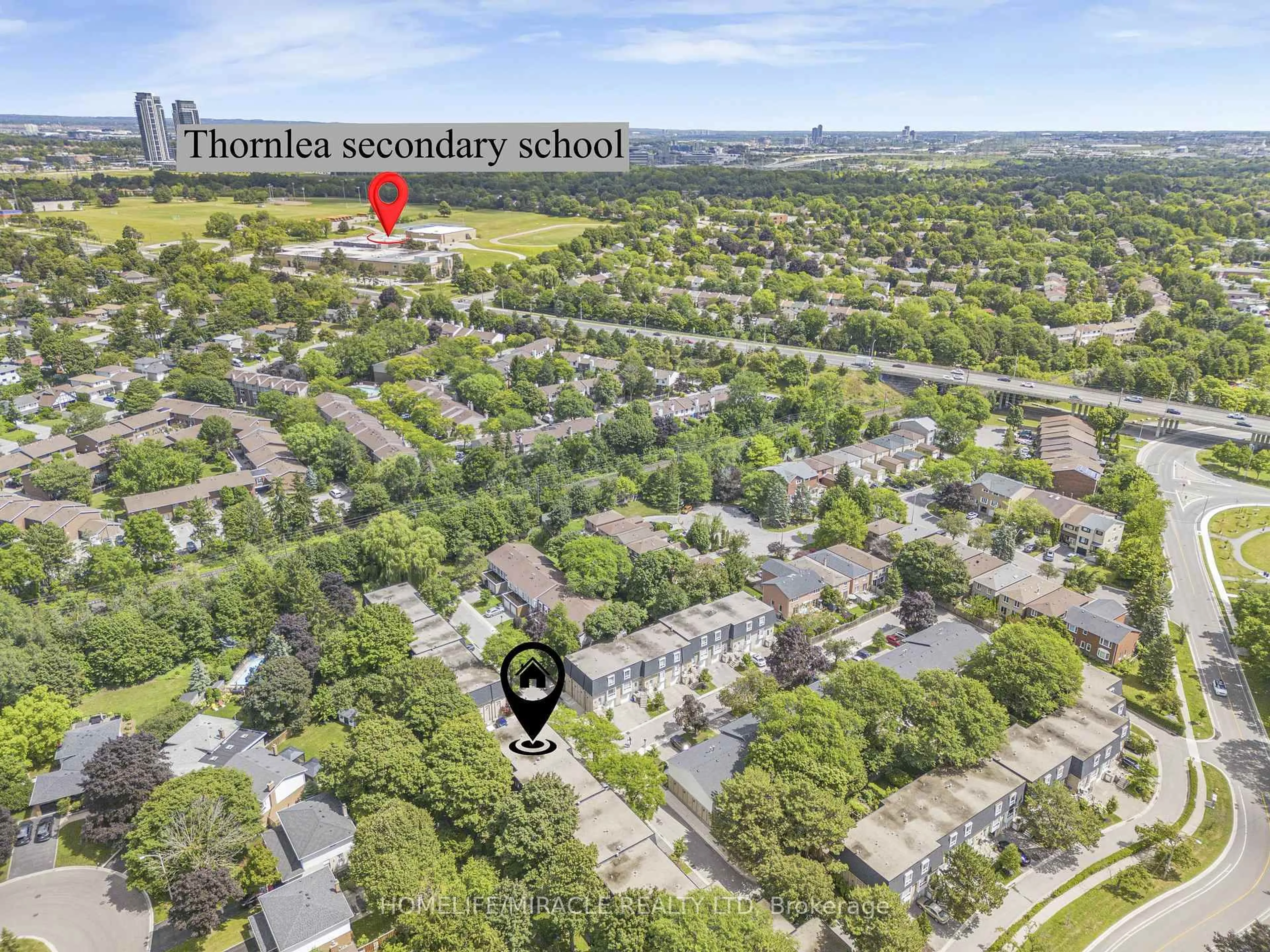A pic from outside/outdoor area/front of a property/back of a property/a pic from drone, street for 210 Royal Orchard Blvd #51, Markham Ontario L3T 3E7
