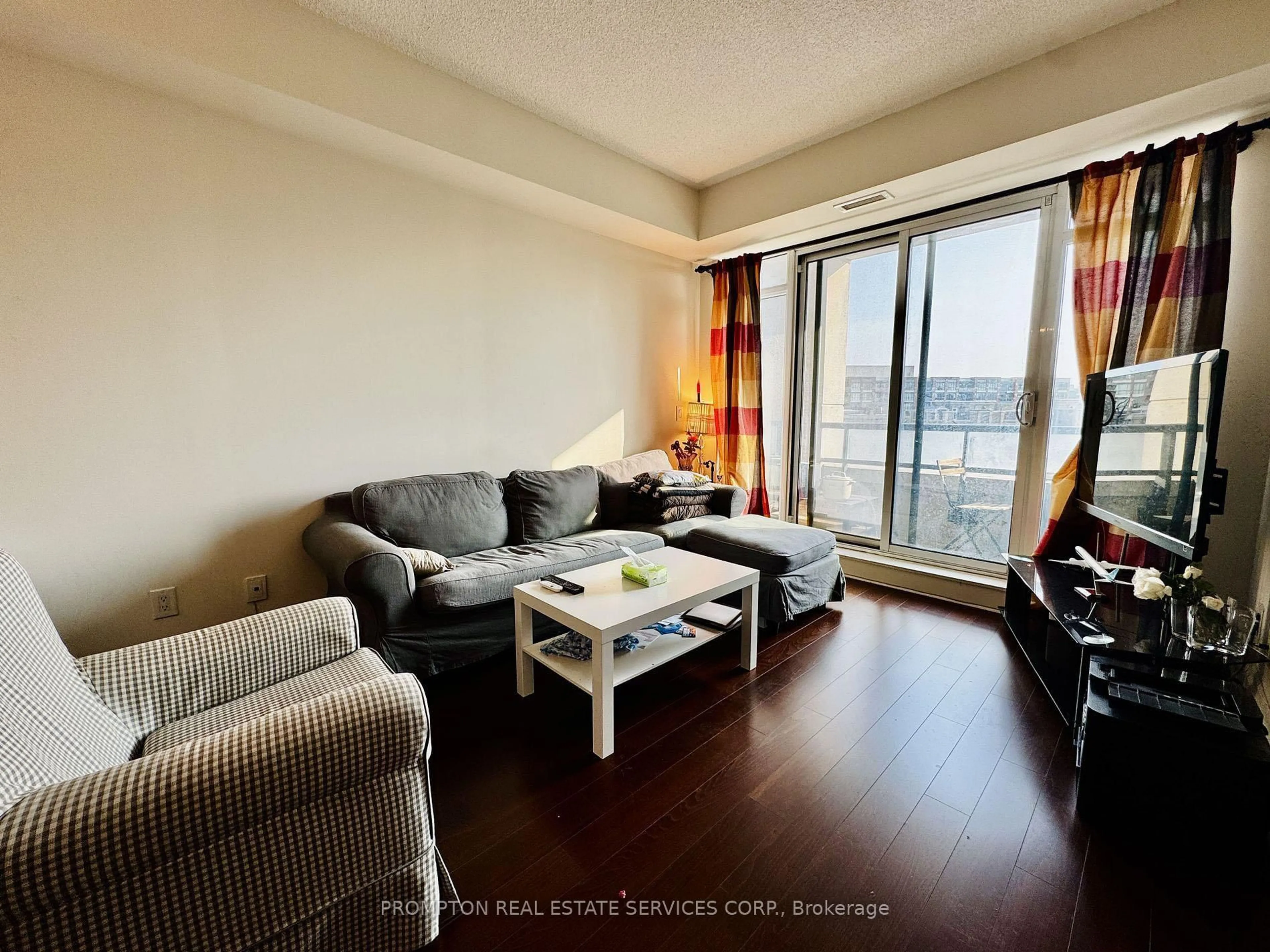 Living room with furniture, wood/laminate floor for 111 UPPER DUKE Cres #503, Markham Ontario L6G 0C8