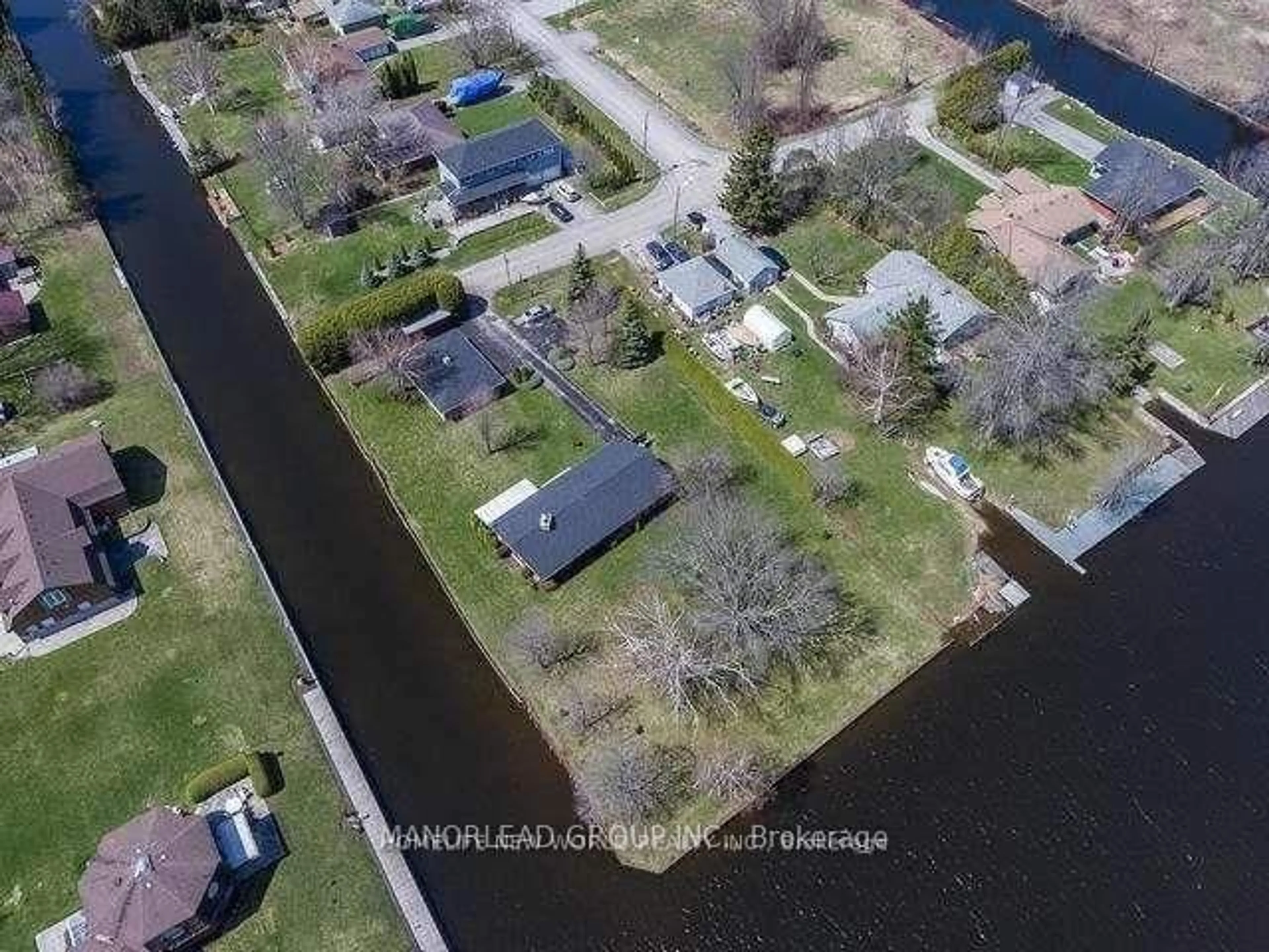 A pic from outside/outdoor area/front of a property/back of a property/a pic from drone, water/lake/river/ocean view for 31 Villa Dr, Georgina Ontario L0E 1N0