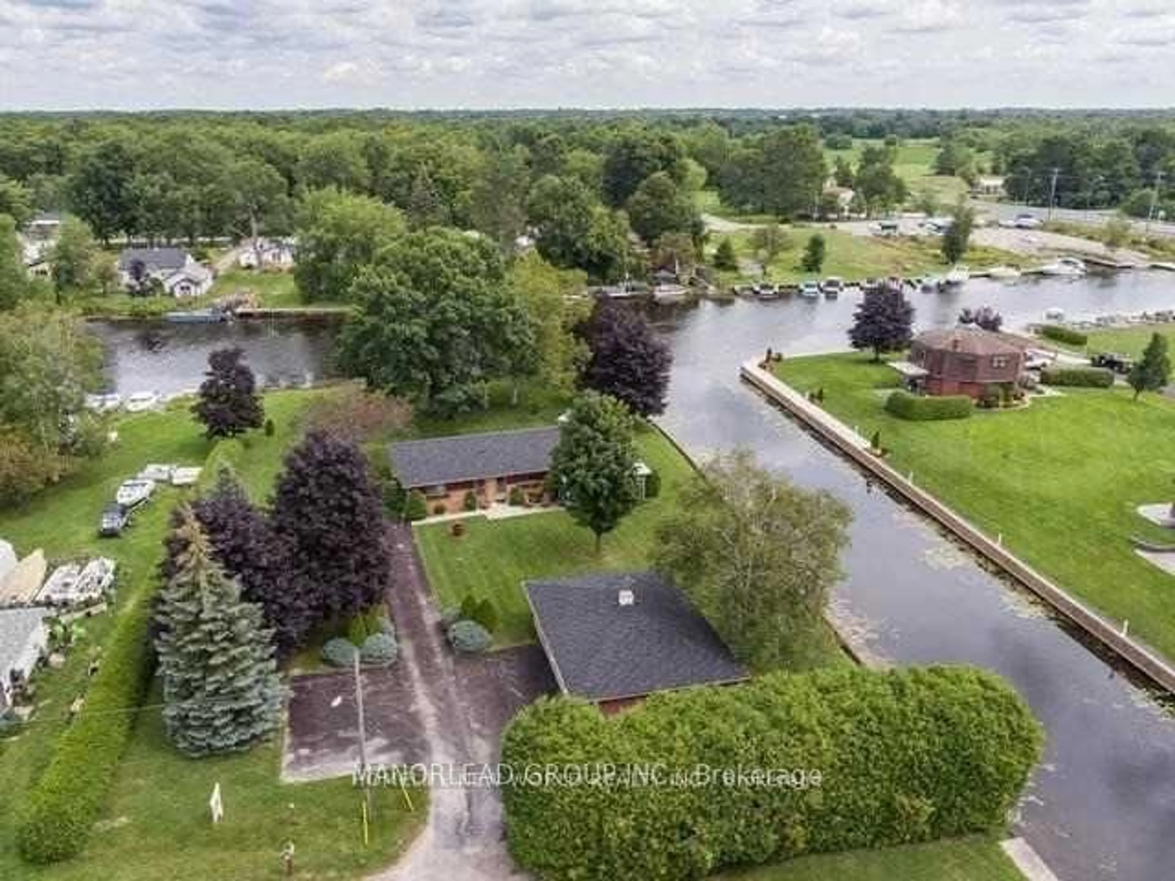 A pic from outside/outdoor area/front of a property/back of a property/a pic from drone, water/lake/river/ocean view for 31 Villa Dr, Georgina Ontario L0E 1N0