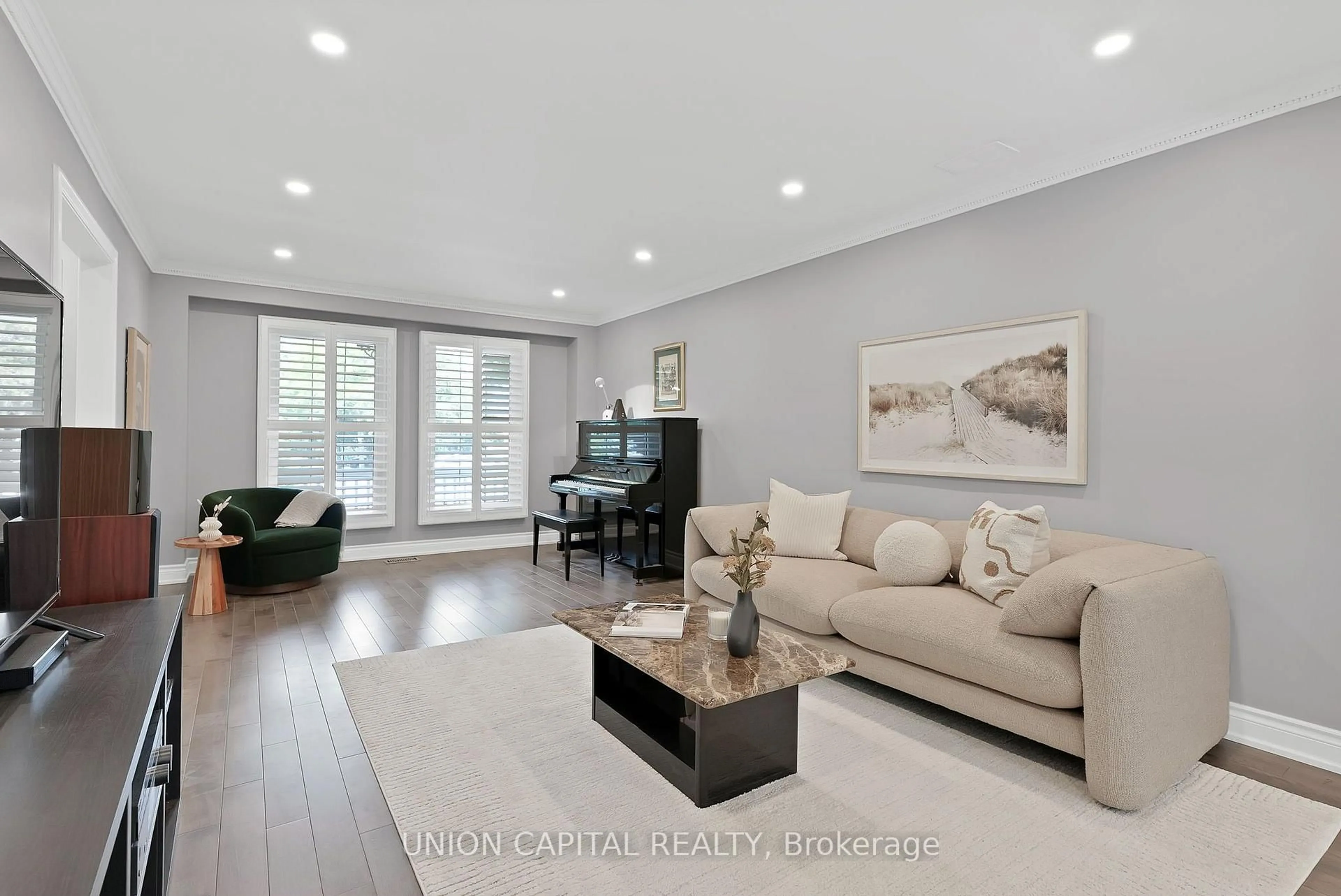 Living room with furniture, wood/laminate floor for 35 McCarty Cres, Markham Ontario L3P 4R4