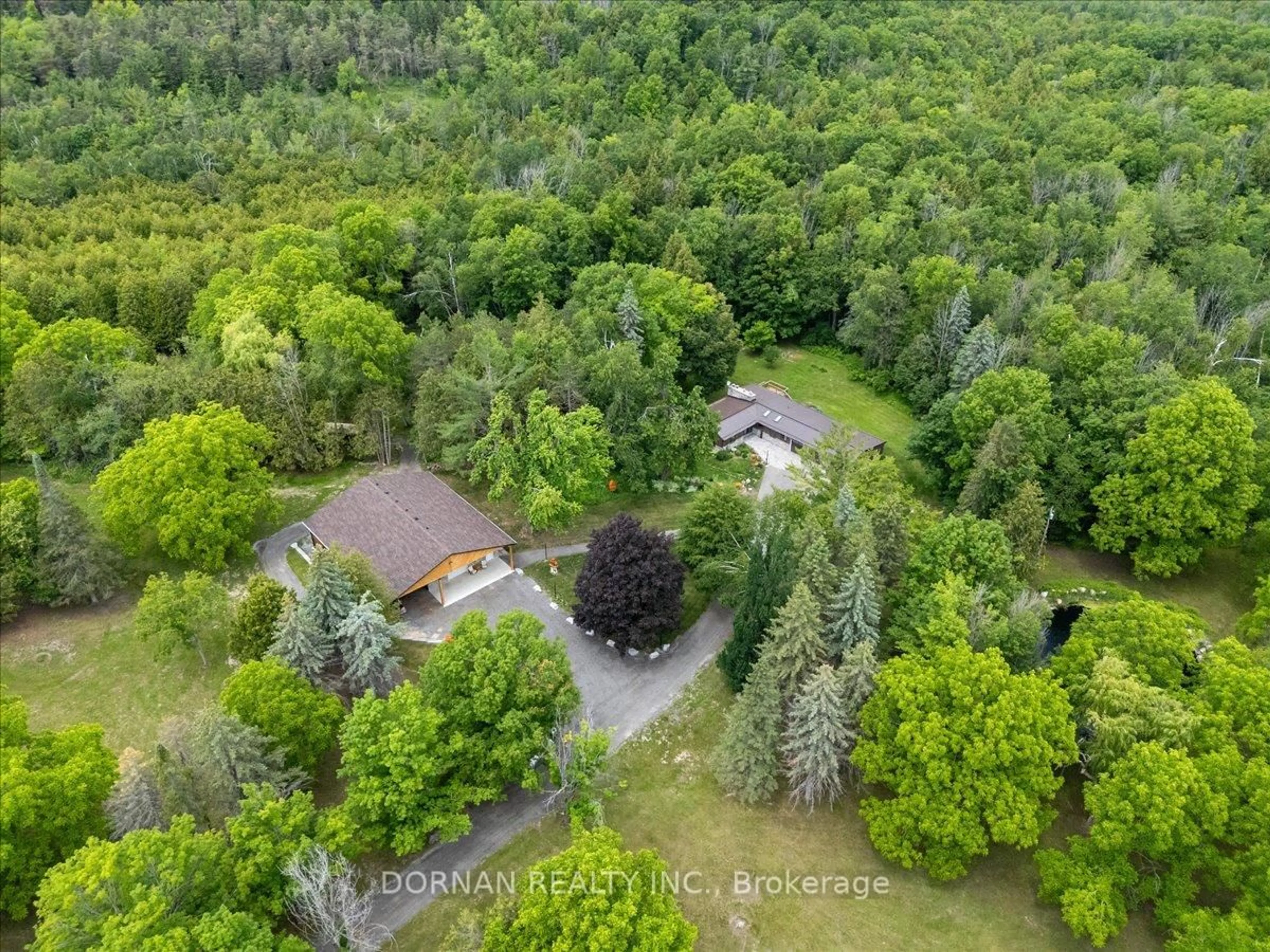 A pic from outside/outdoor area/front of a property/back of a property/a pic from drone, forest/trees view for 1975 Concession 4 Rd, Brock Ontario L0C 1H0