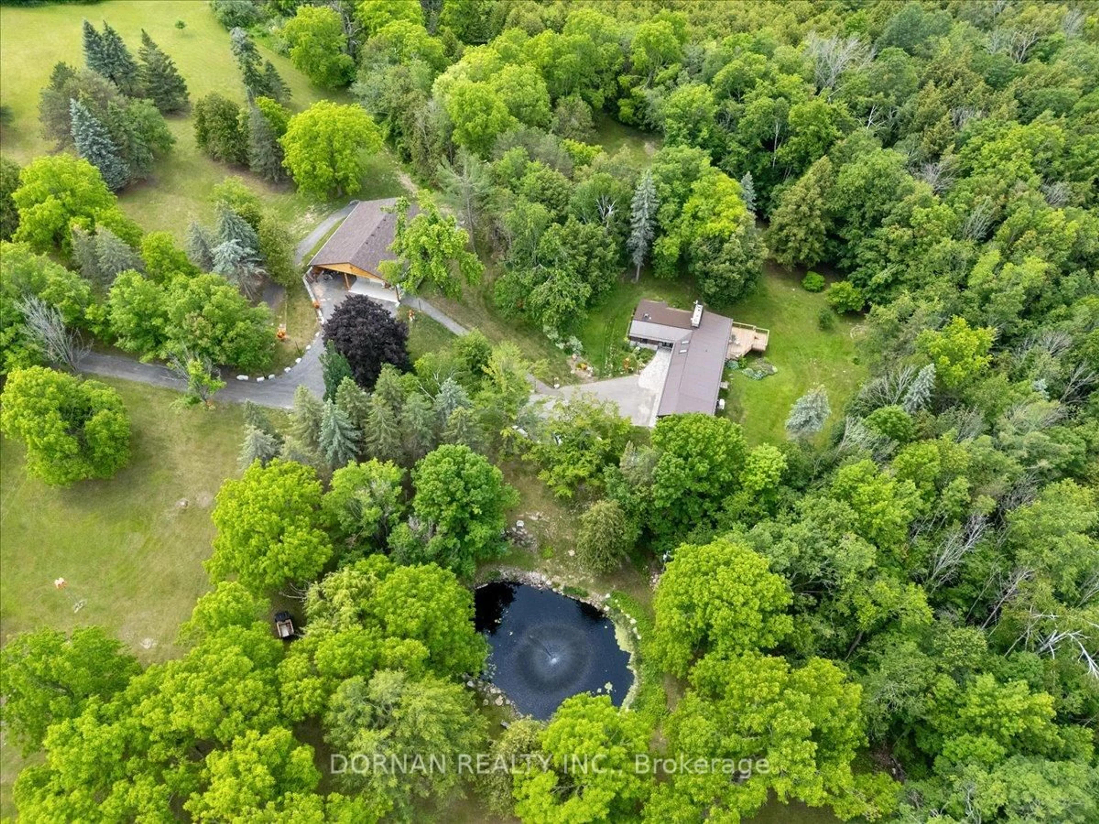 A pic from outside/outdoor area/front of a property/back of a property/a pic from drone, forest/trees view for 1975 Concession 4 Rd, Brock Ontario L0C 1H0