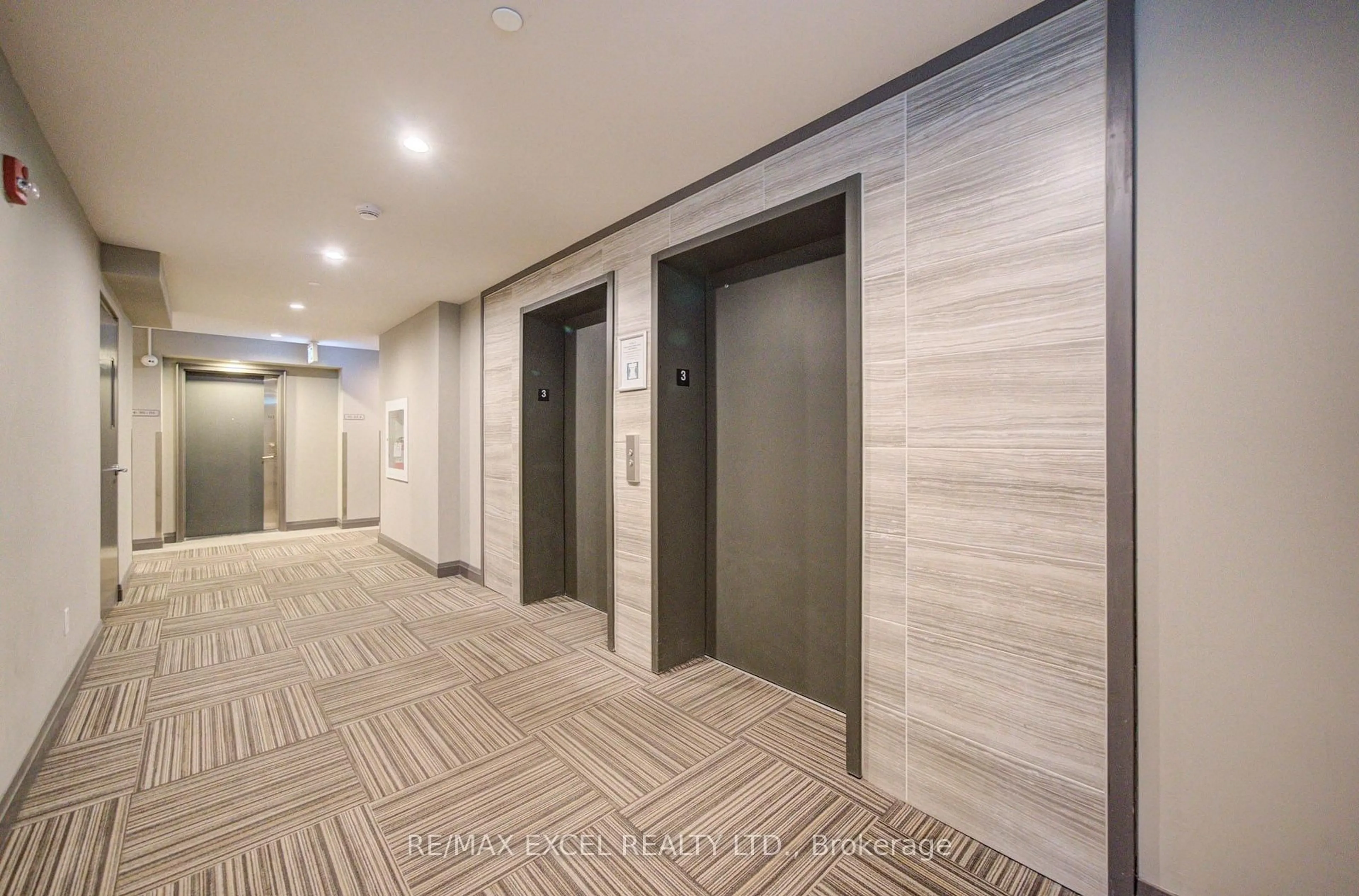 Indoor foyer for 2 Adam Sellers St #302, Markham Ontario L6B 1P2