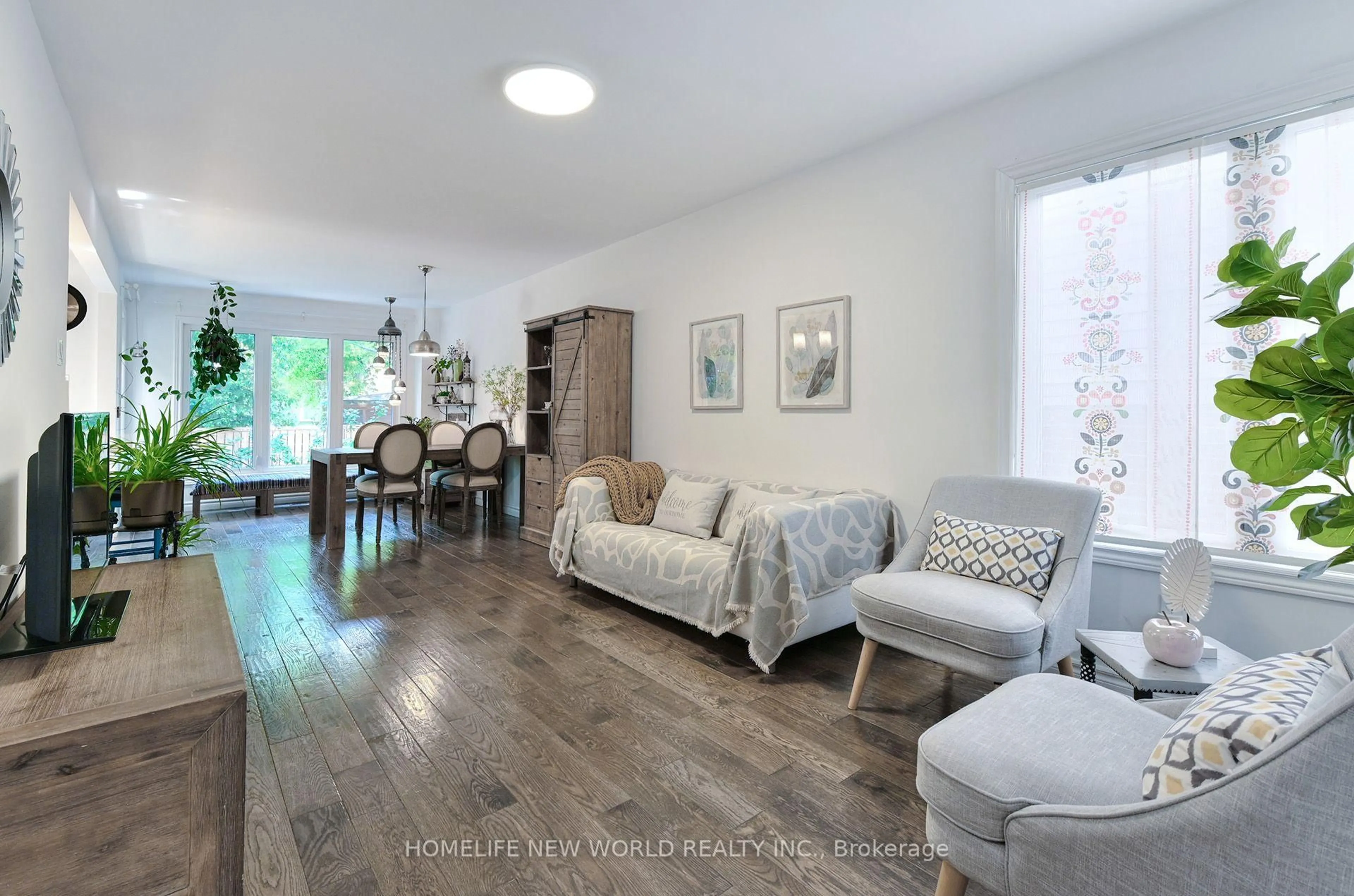 Living room with furniture, wood/laminate floor for 115 Winding Lane, Vaughan Ontario L4J 5J1