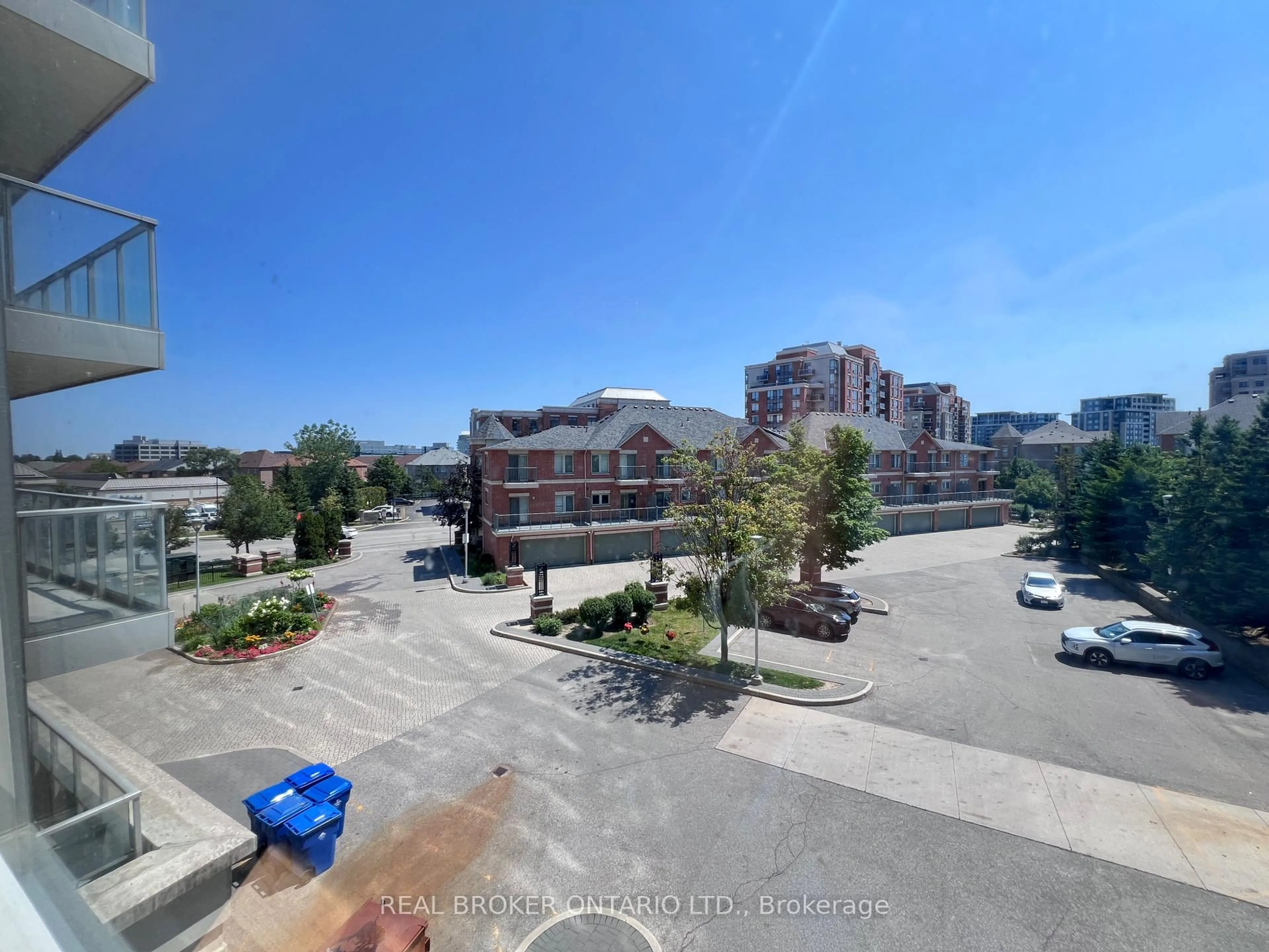 A pic from outside/outdoor area/front of a property/back of a property/a pic from drone, unknown for 88 Times Ave #310, Markham Ontario L3T 7Z4