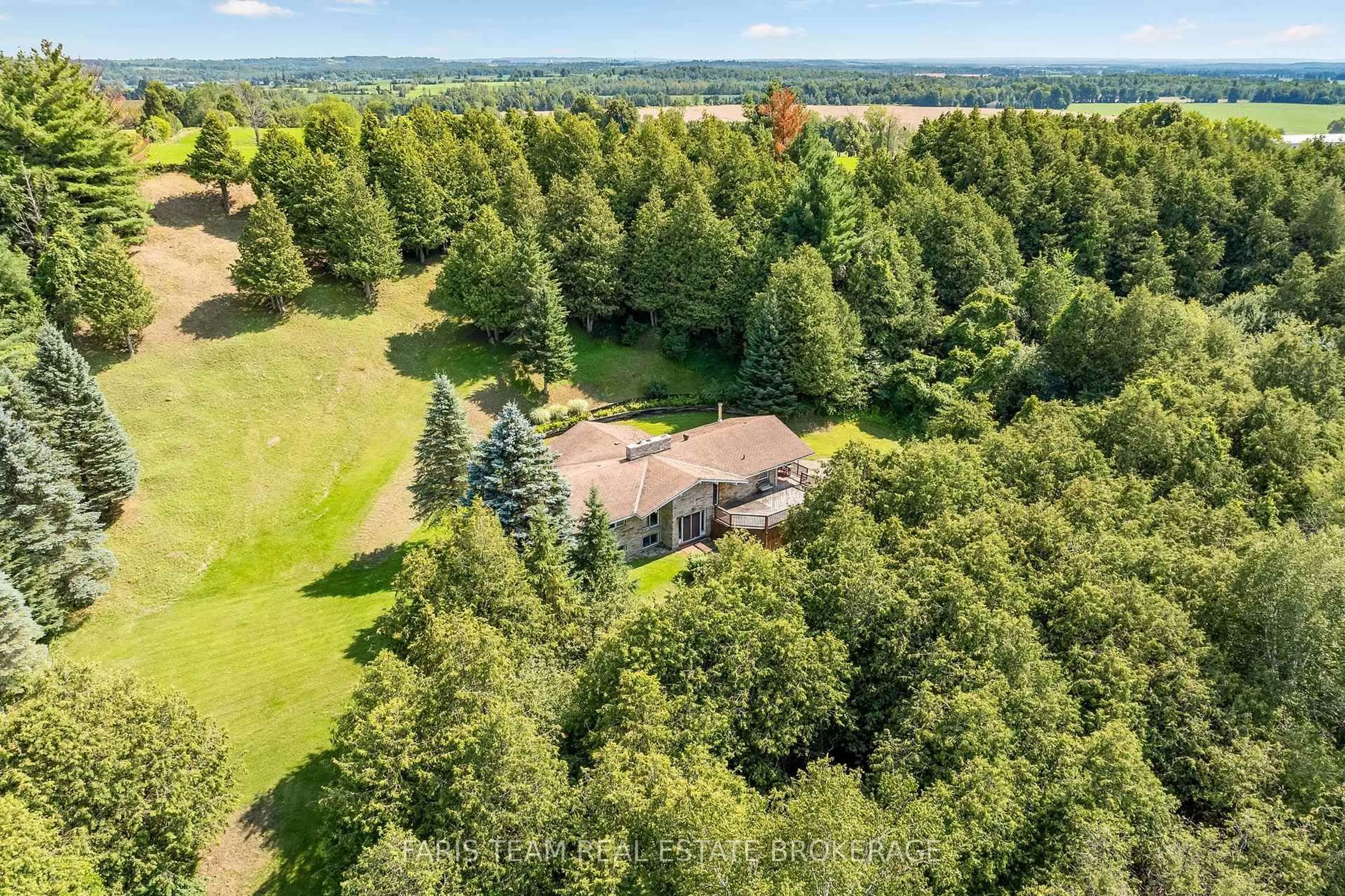 A pic from outside/outdoor area/front of a property/back of a property/a pic from drone, forest/trees view for 5809 10th Sdrd, Essa Ontario L0L 1N0