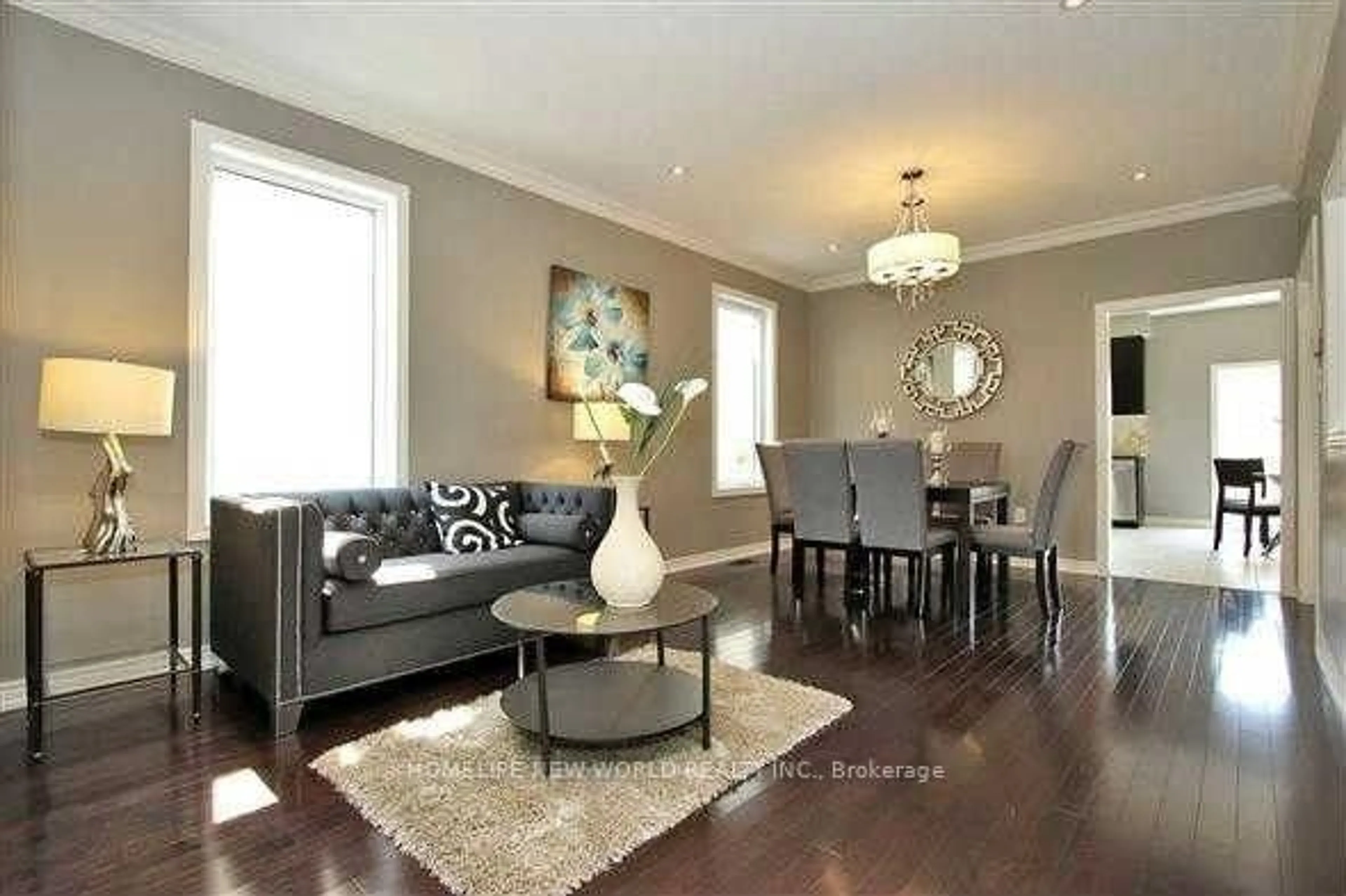 Living room with furniture, wood/laminate floor for 20 Pineforest Pl, Markham Ontario L6E 2B1