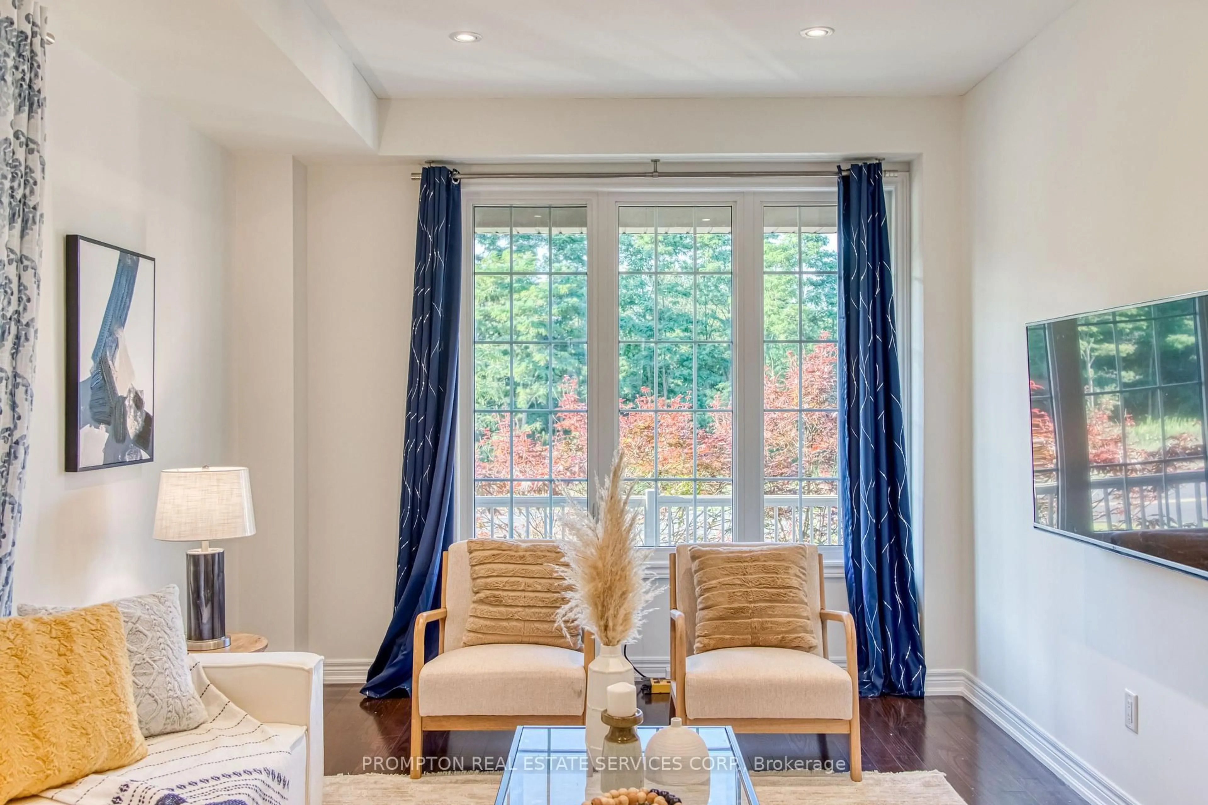 Living room with furniture, wood/laminate floor for 2762 Donald Cousens Pkwy, Markham Ontario L6B 0X8
