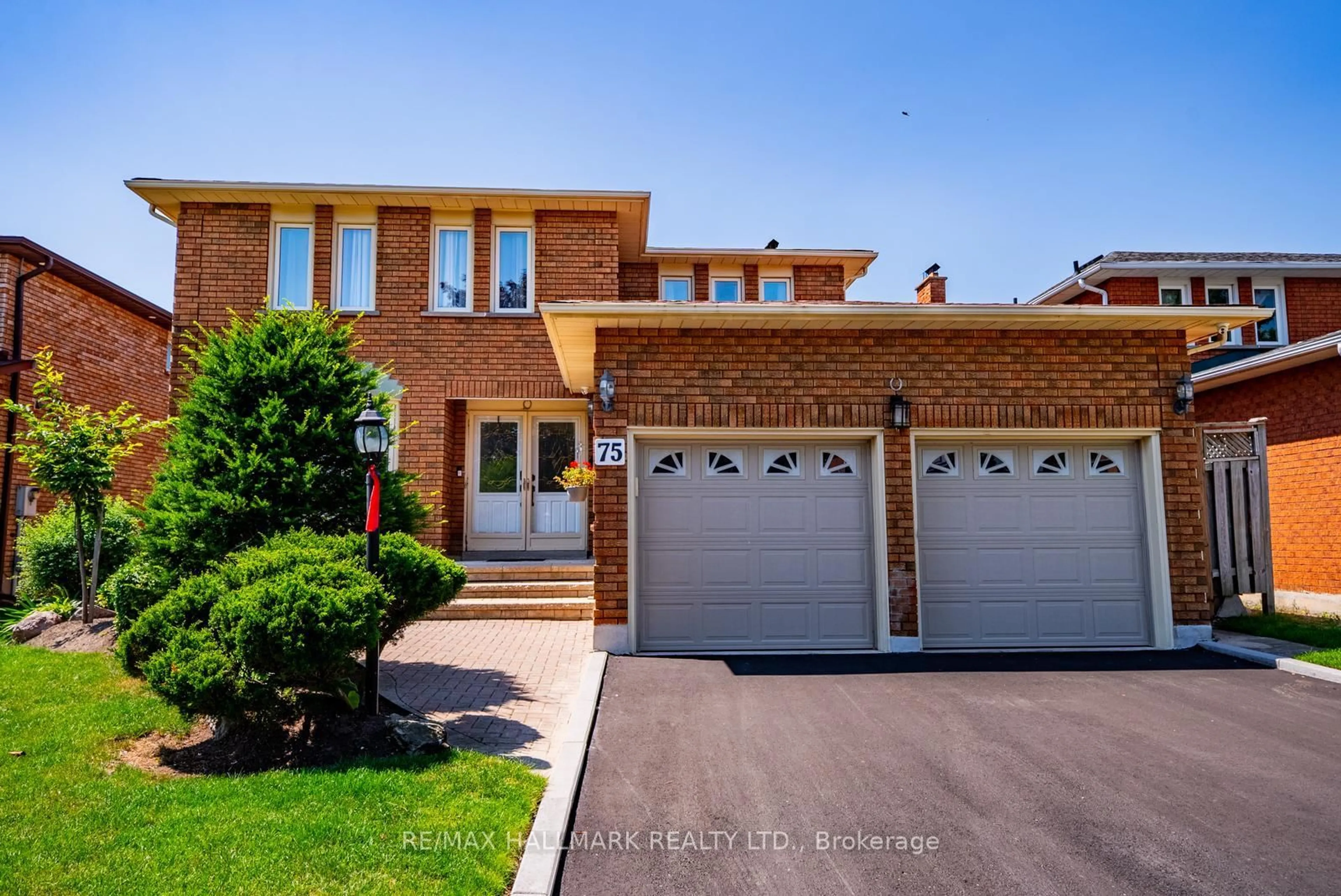 Home with brick exterior material, street for 75 Captain Francis Dr, Markham Ontario L3R 9E5