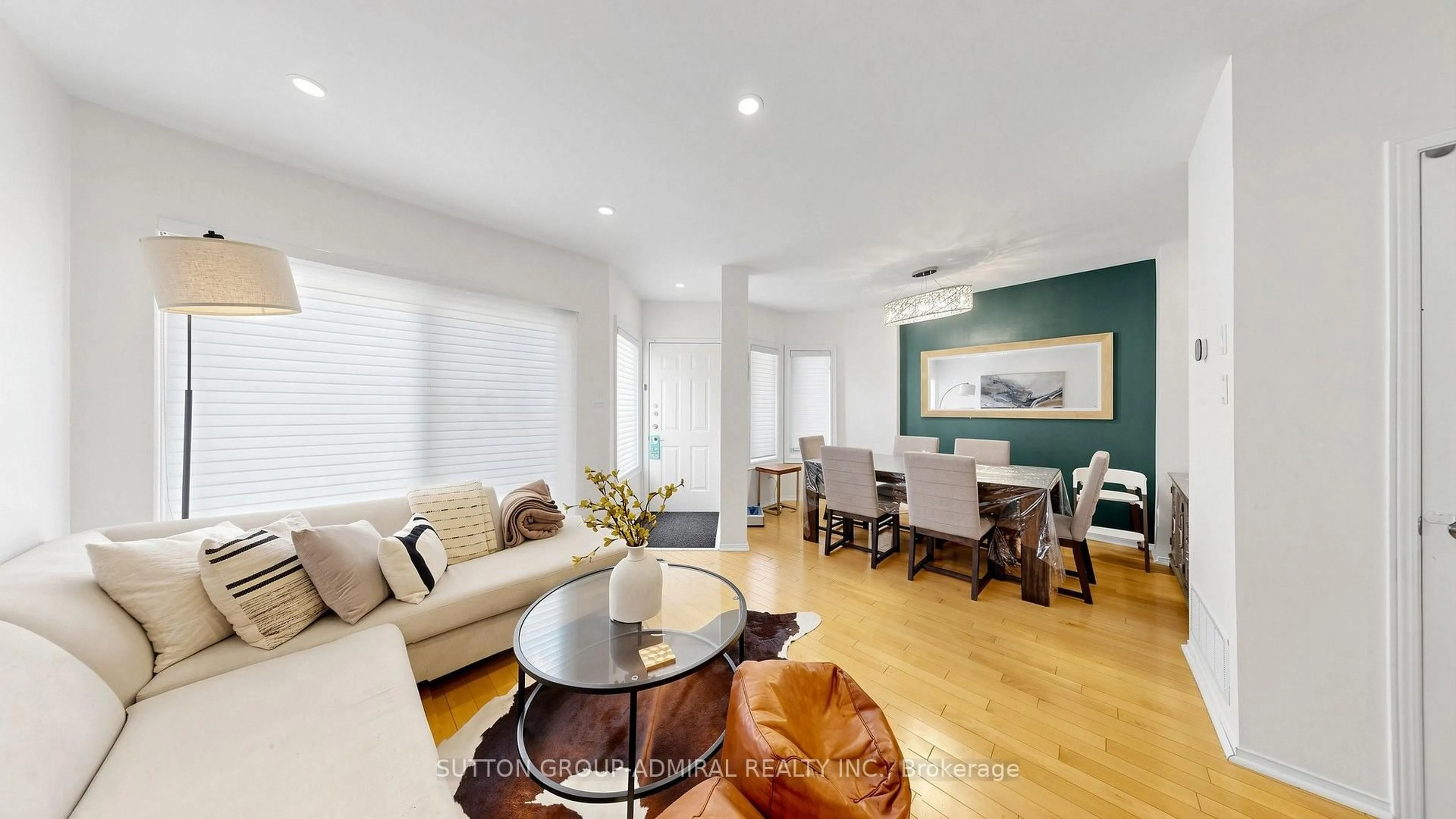Living room with furniture, wood/laminate floor for 735 New Westminster Dr #46, Vaughan Ontario L4J 7Y9
