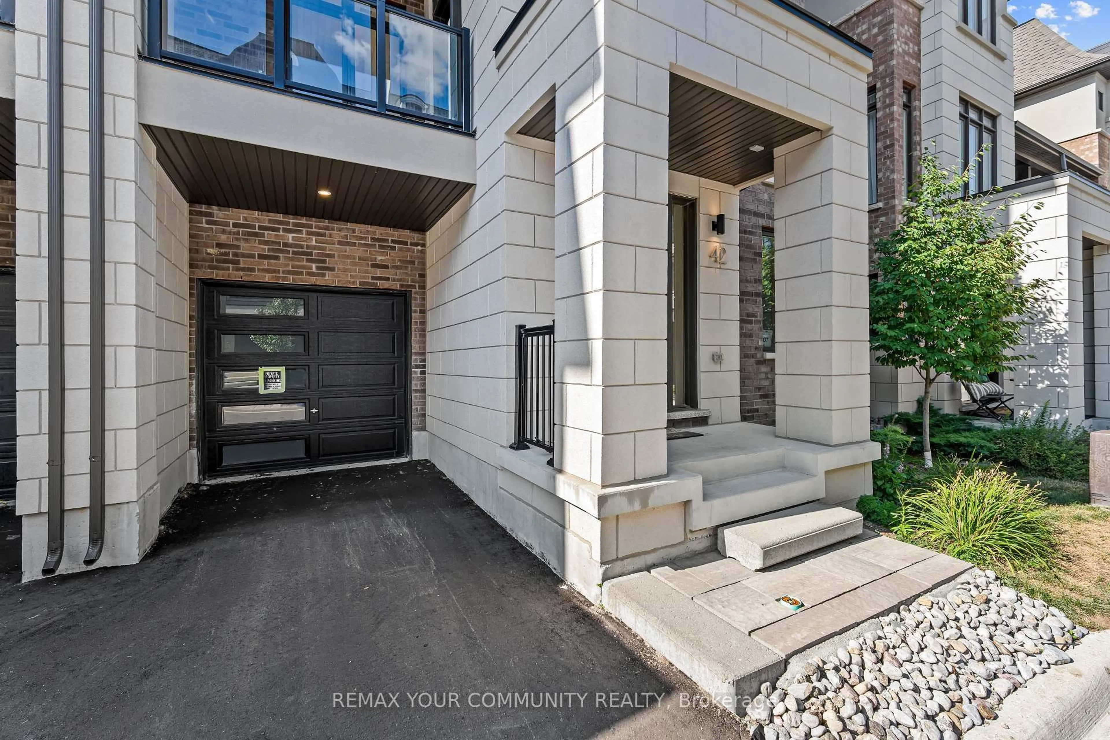 Home with brick exterior material, street for 42 Globemaster Lane, Richmond Hill Ontario L4E 1H4