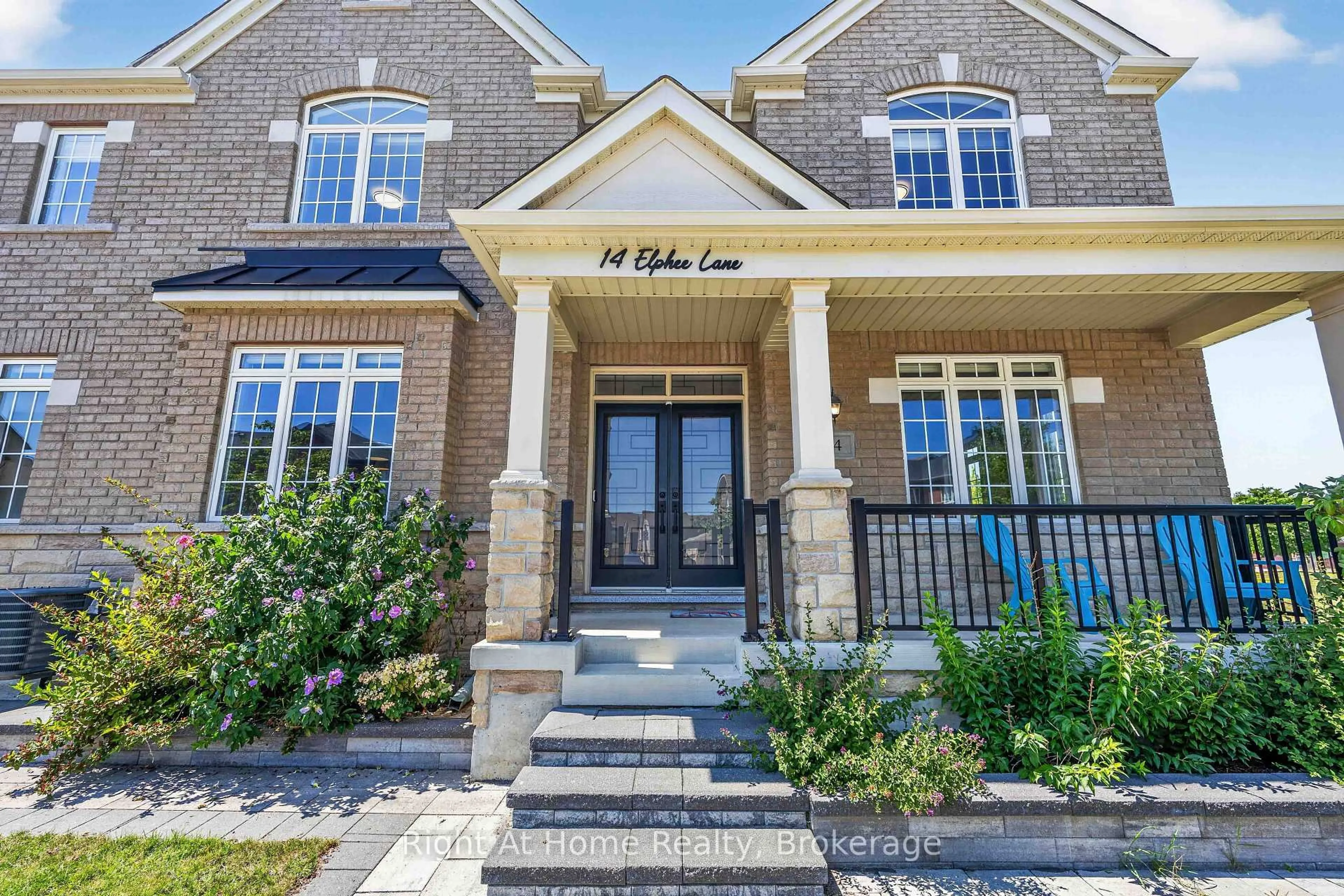 Home with brick exterior material, street for 14 Elphee Lane, Markham Ontario L6B 0Z5