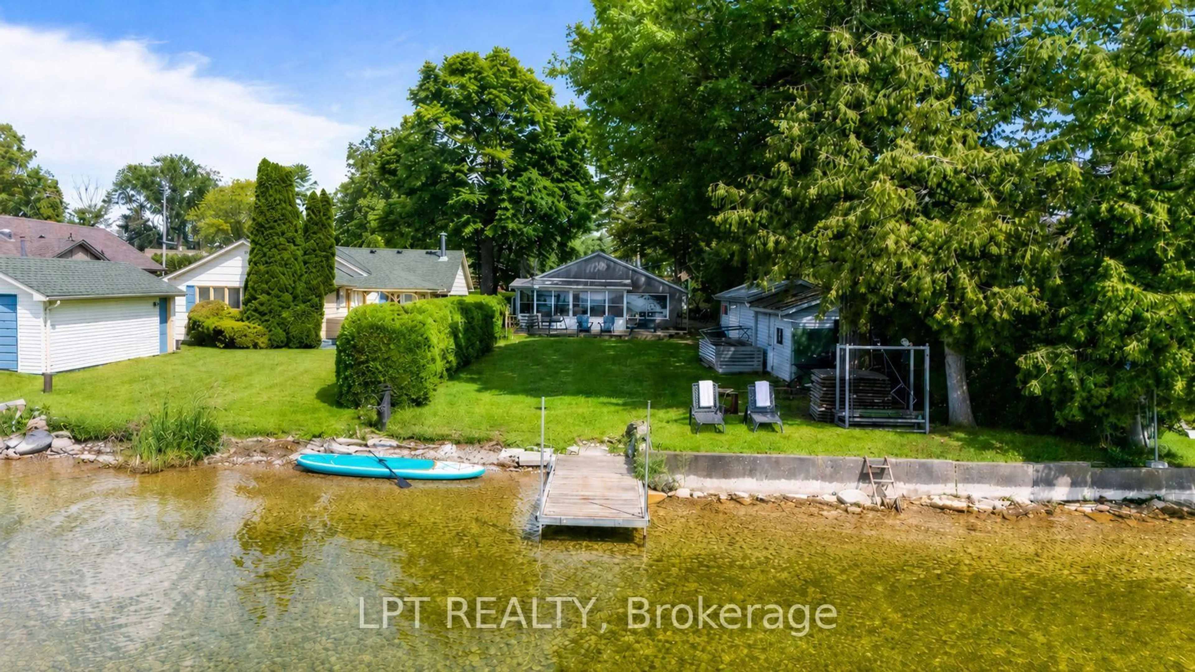 A pic from outside/outdoor area/front of a property/back of a property/a pic from drone, water/lake/river/ocean view for 66 Blue Heron Dr, Georgina Ontario L0E 1N0