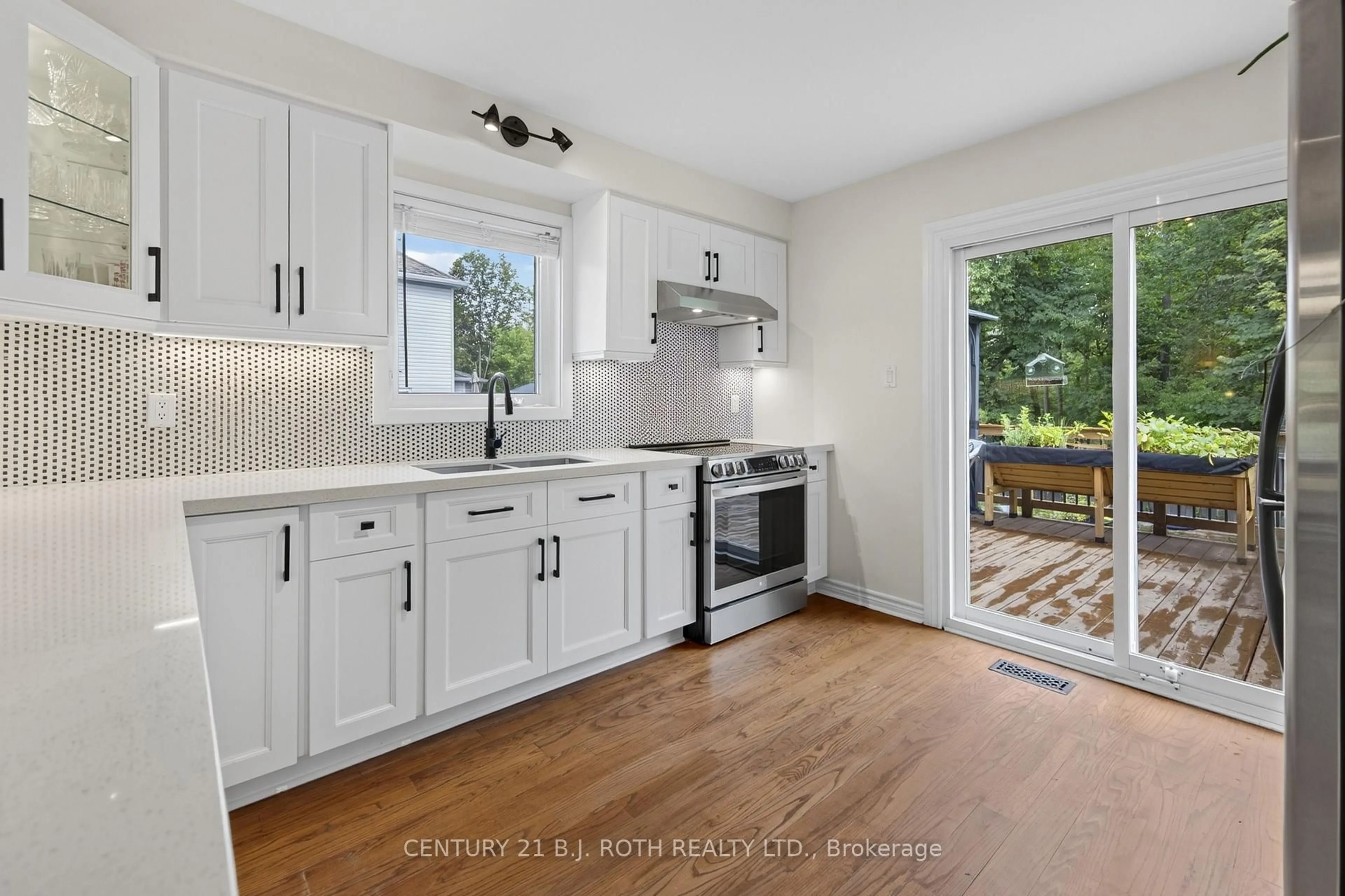 Open concept kitchen, ceramic/tile floor for 22 Michael St, Essa Ontario L0M 1B2